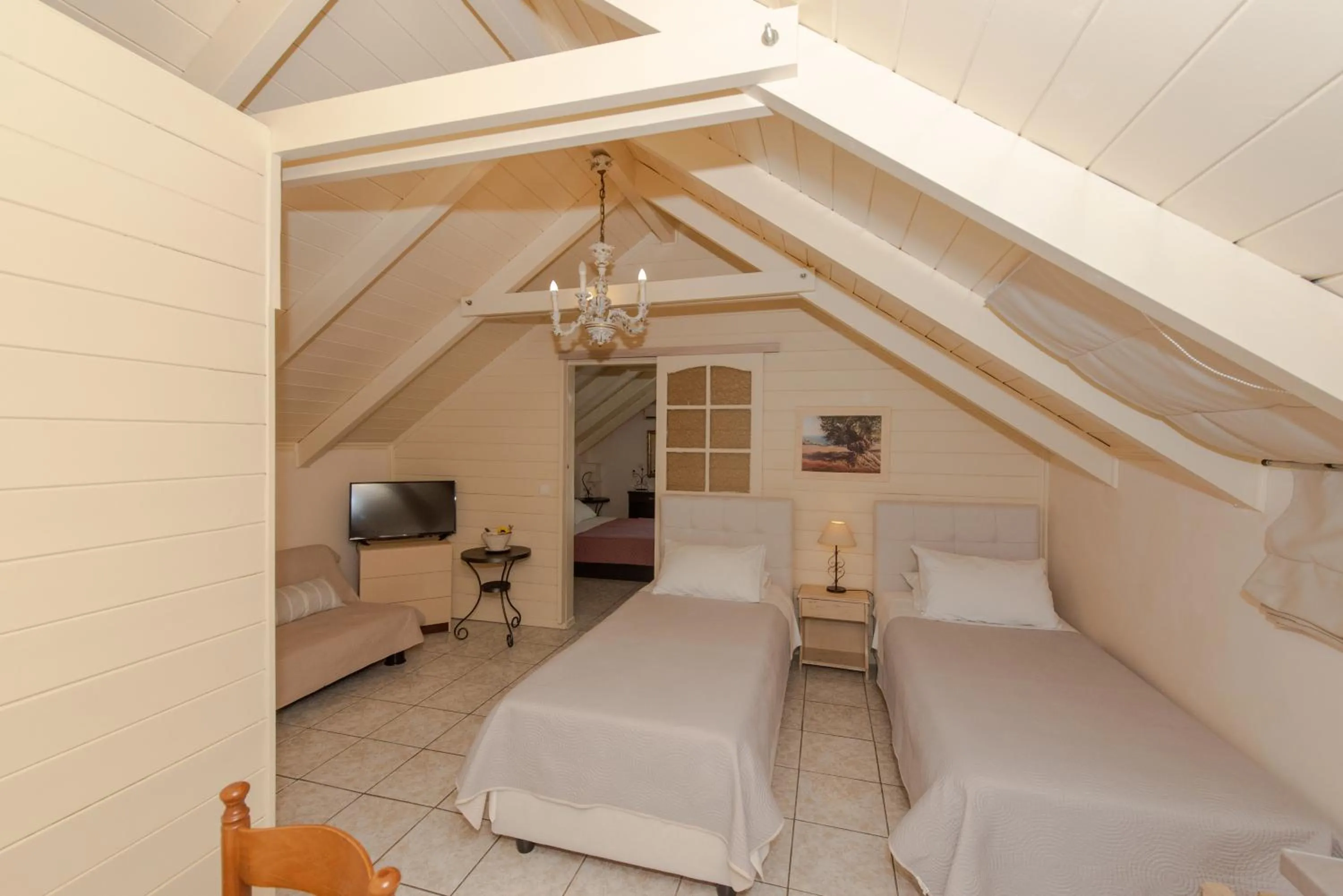 Bed in Tsolakis Studios & Apartments