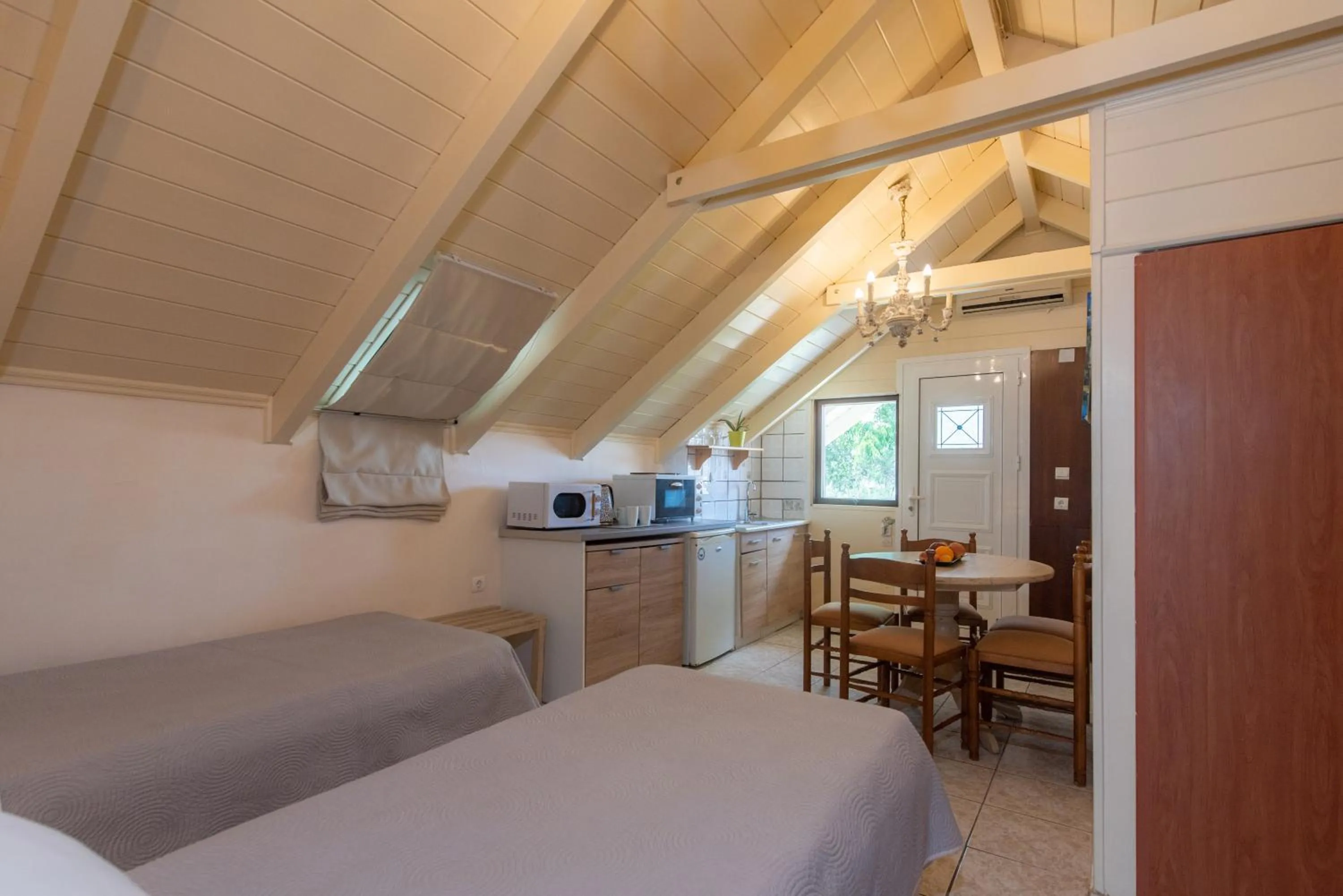 Bed in Tsolakis Studios & Apartments