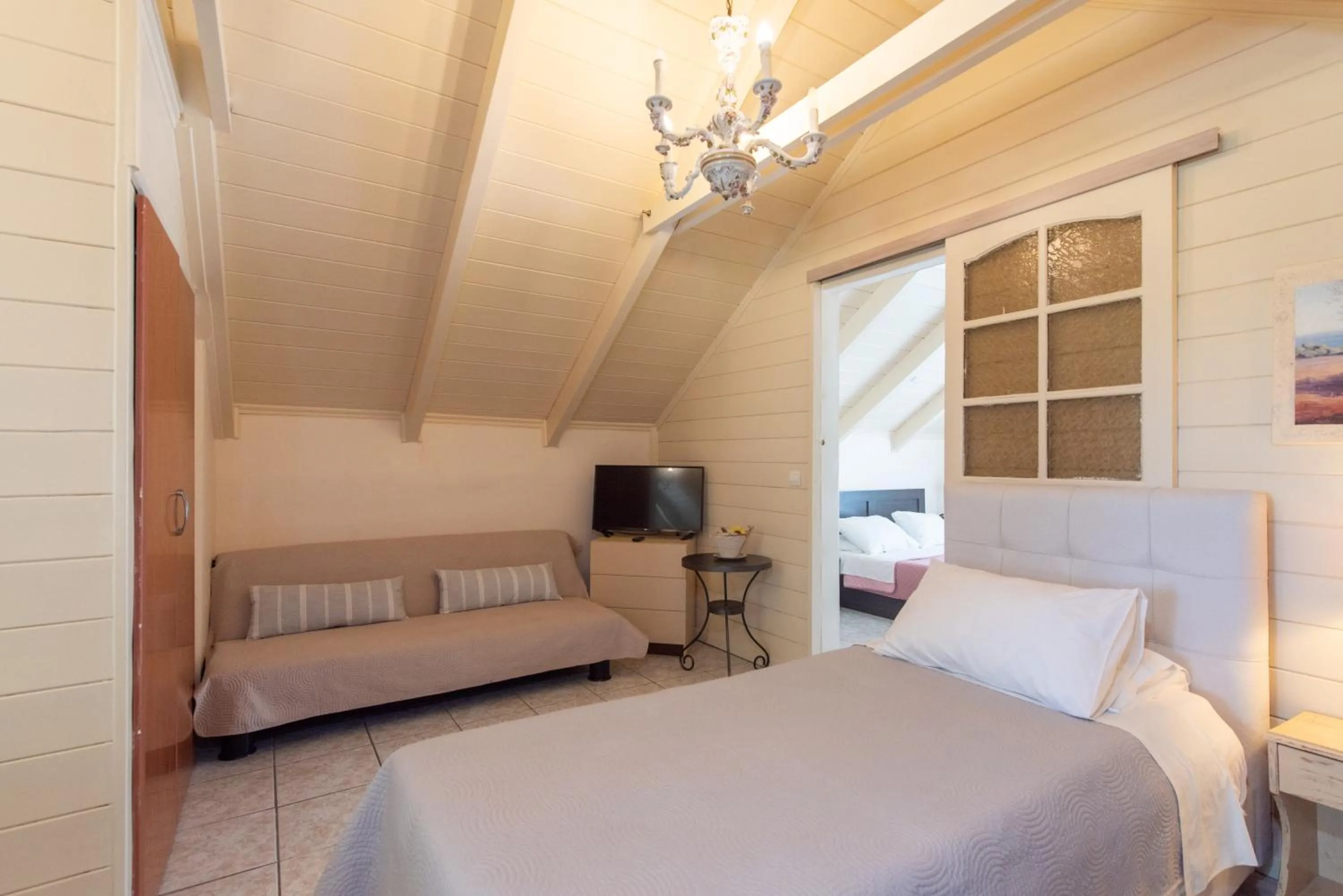 Bed in Tsolakis Studios & Apartments