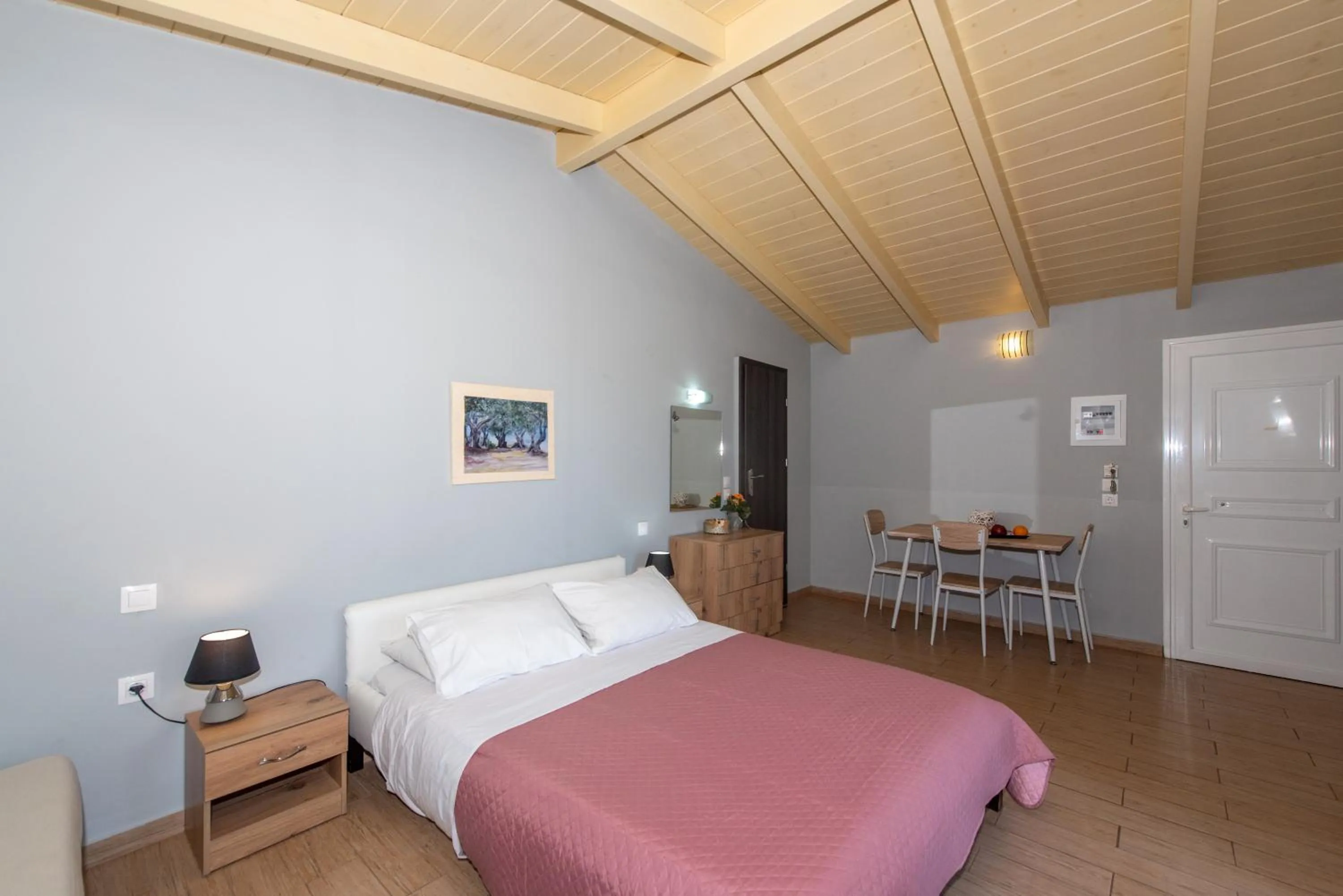 Bed in Tsolakis Studios & Apartments