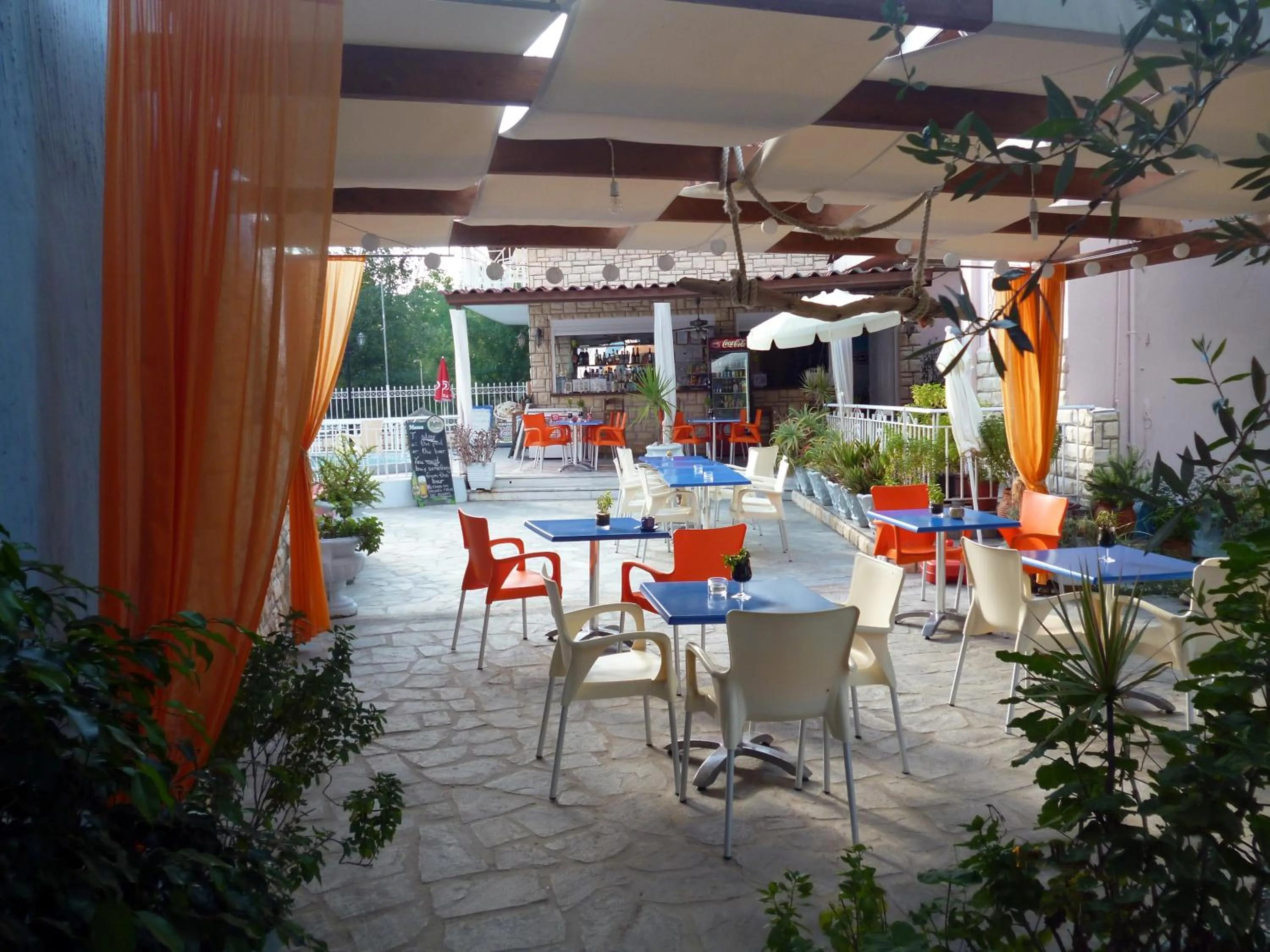 Communal lounge/ TV room in Tsolakis Studios & Apartments