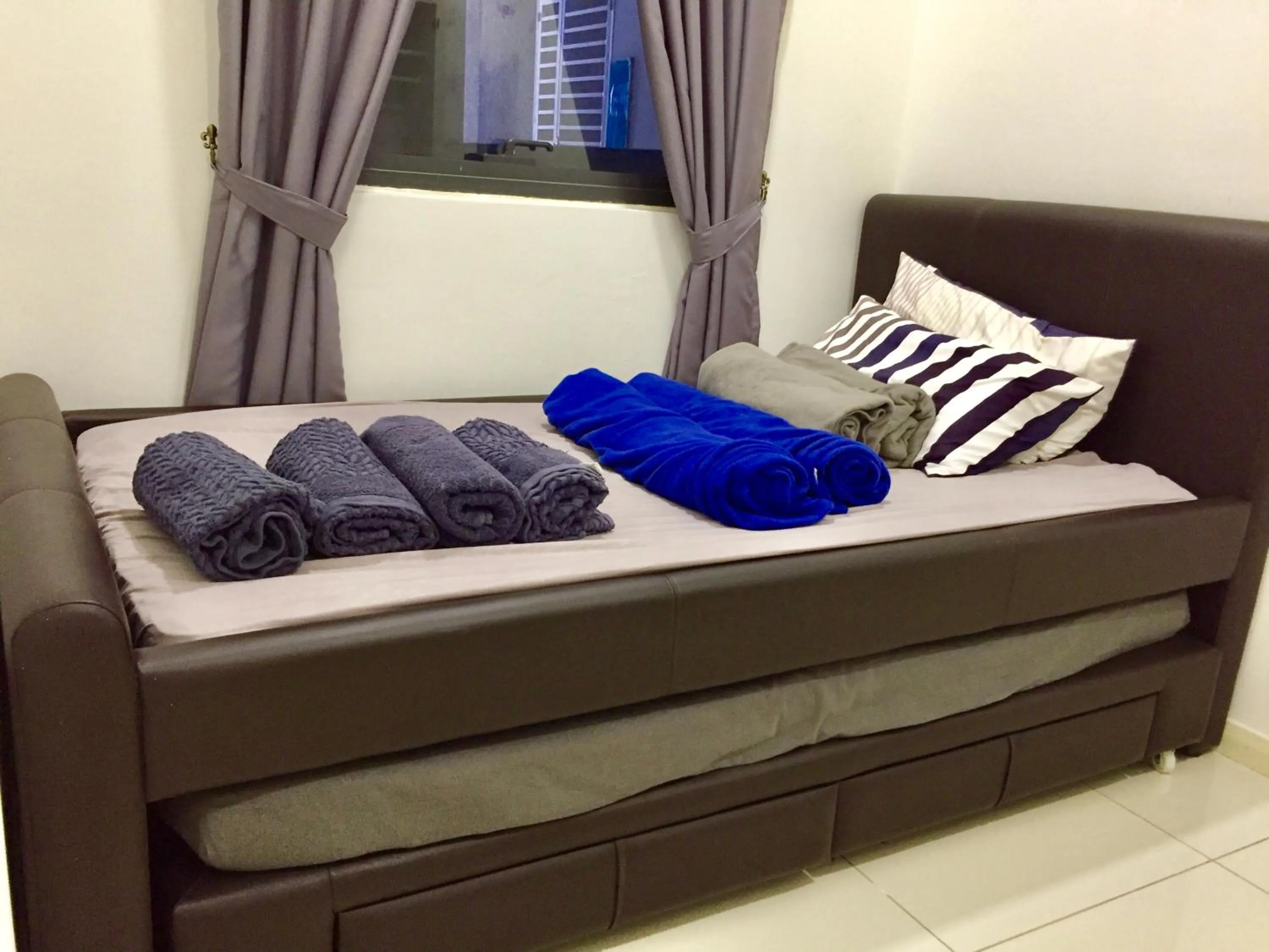 Bed in Charming Suite & Sunway and Petaling Jaya