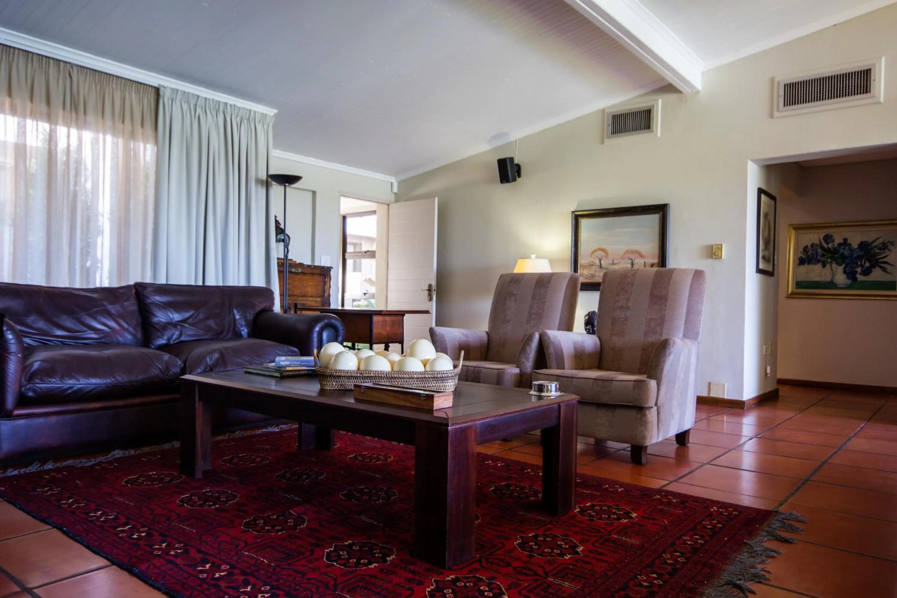 Communal lounge/ TV room in River Place Manor