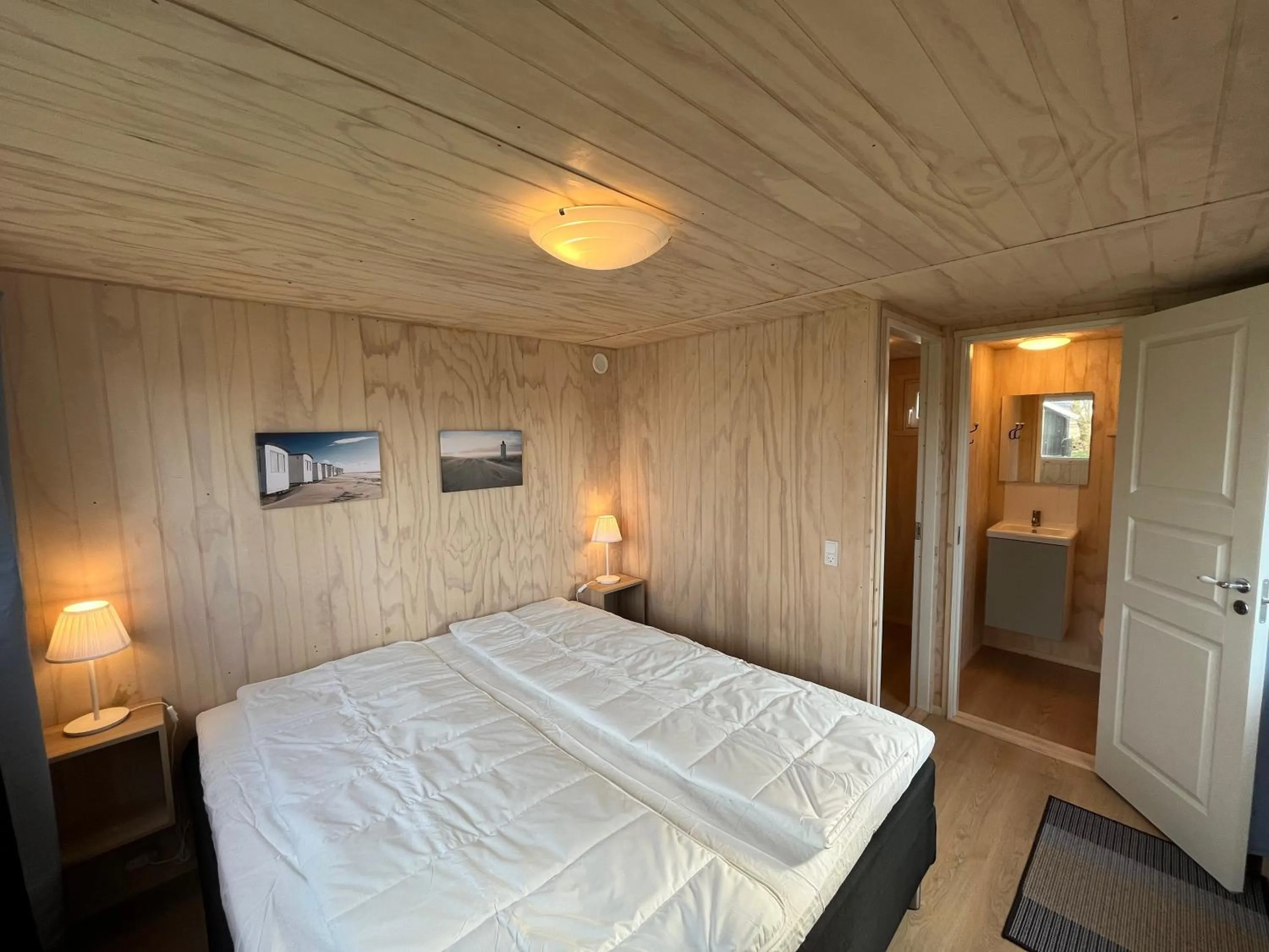 Bed in Løkken Family Camping & Guesthouse