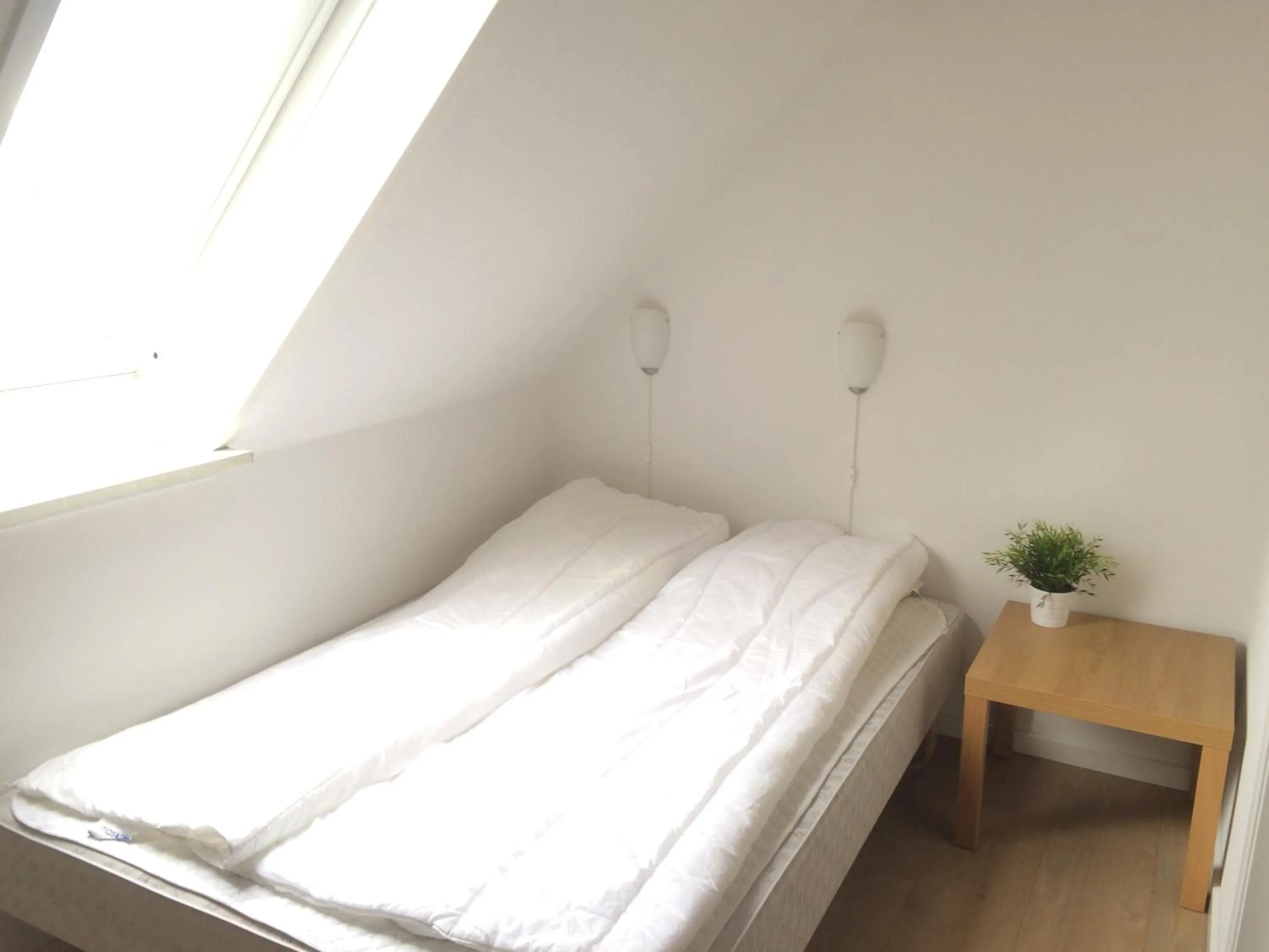 Bed in Løkken Family Camping & Guesthouse