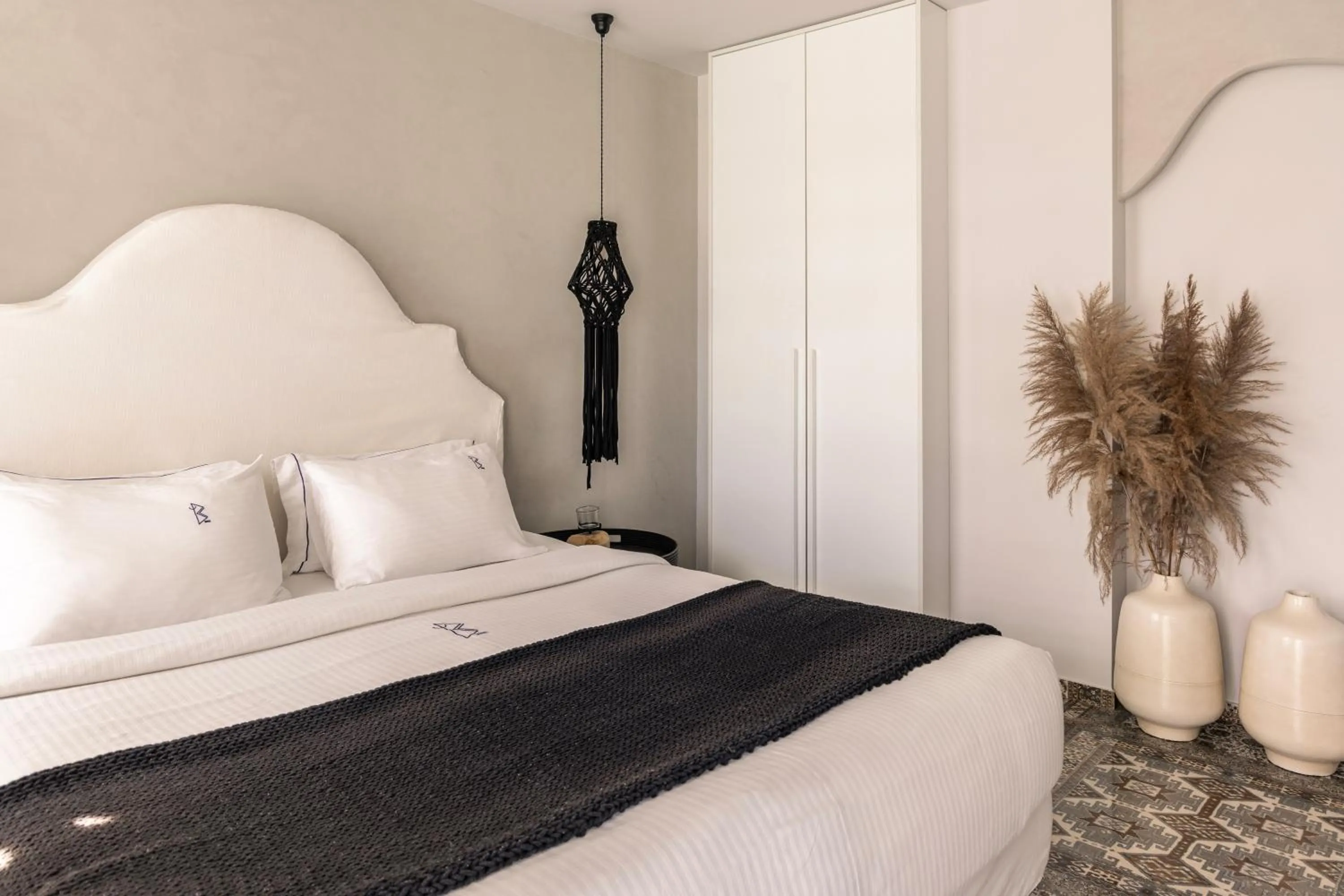 Bed in Blue Carpet Luxury Suites