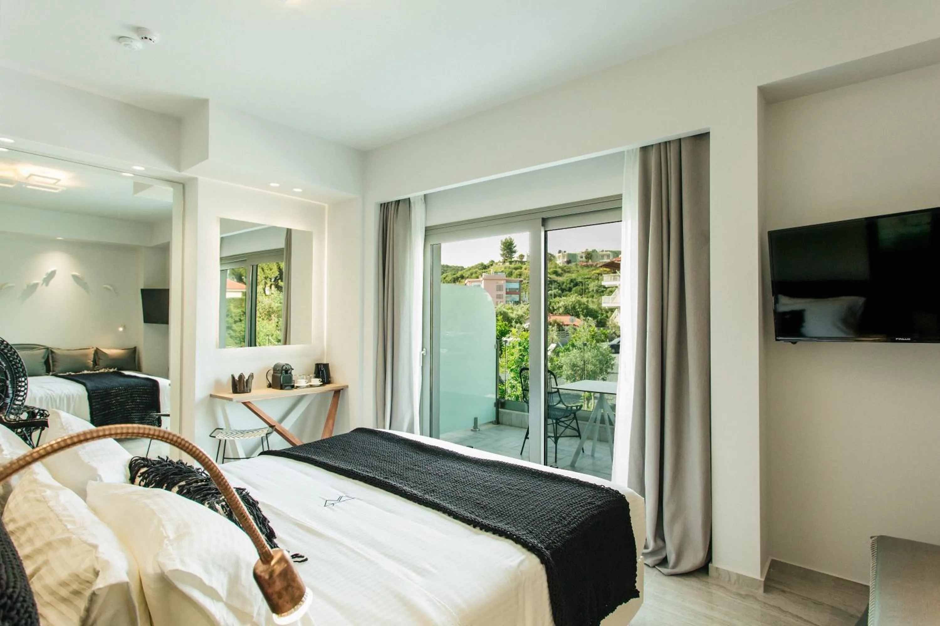 Bed in Blue Carpet Luxury Suites