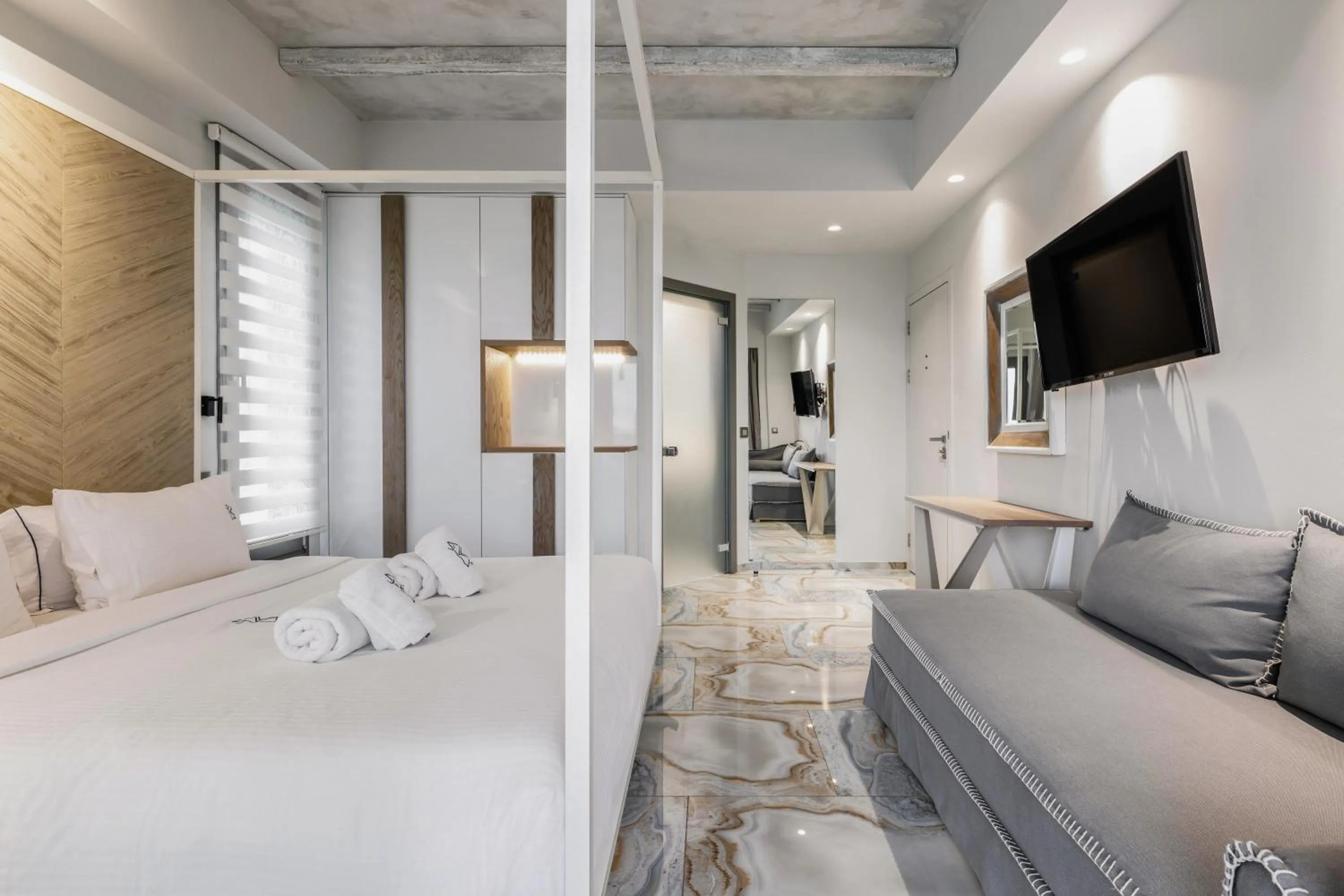 Bed in Blue Carpet Luxury Suites