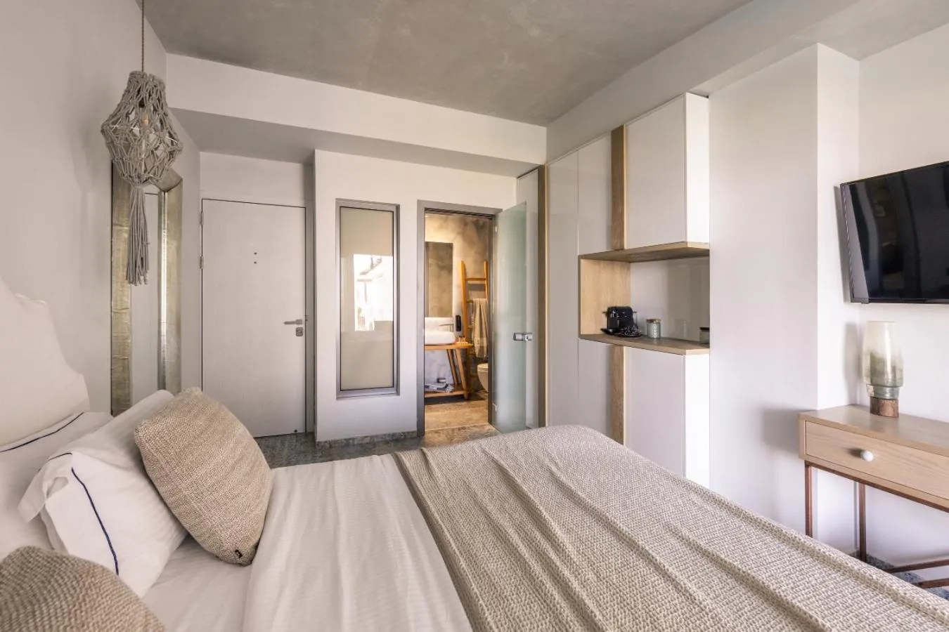 Bed in Blue Carpet Luxury Suites