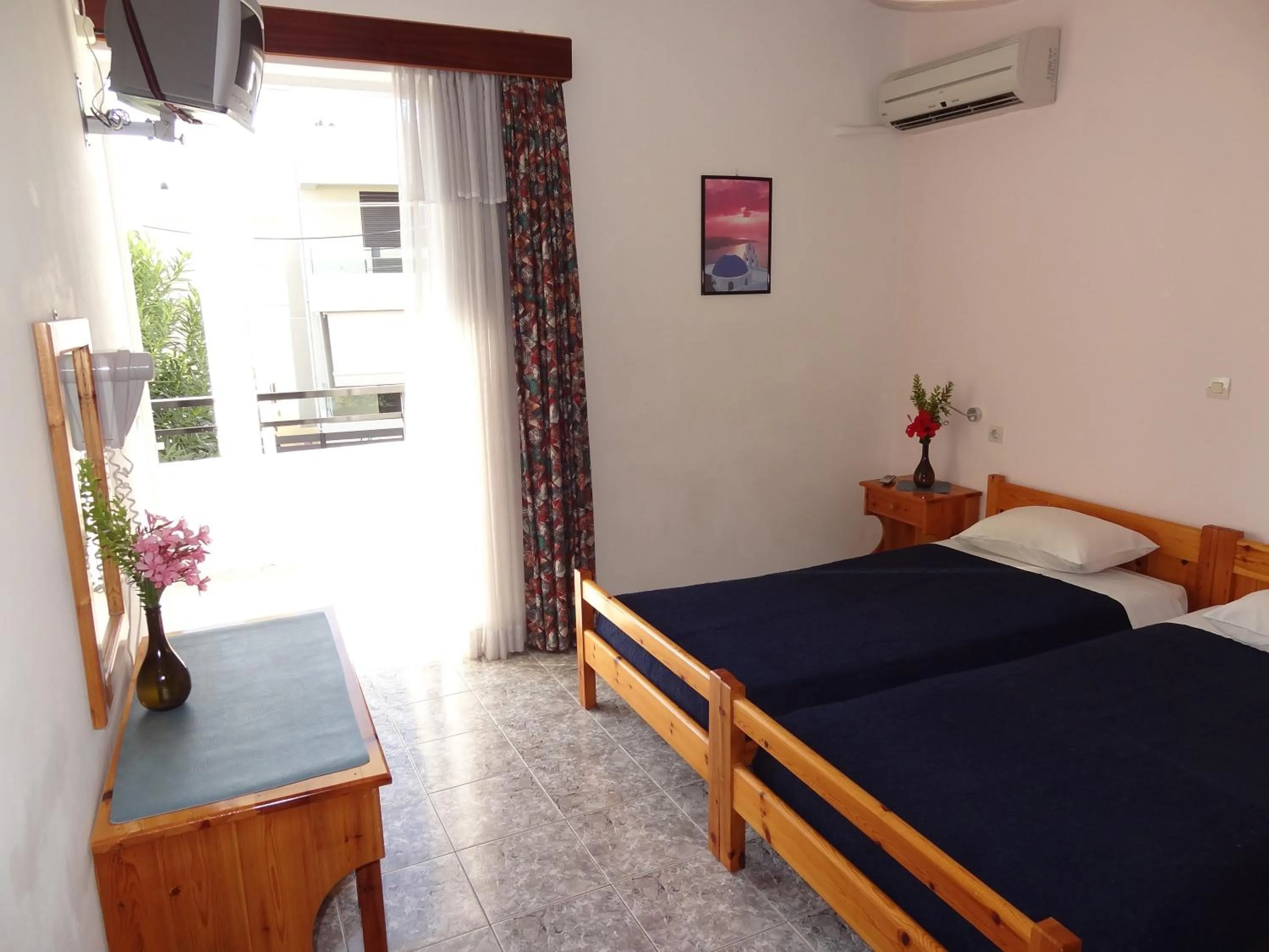 Bed in Michalis Studios & Apartments