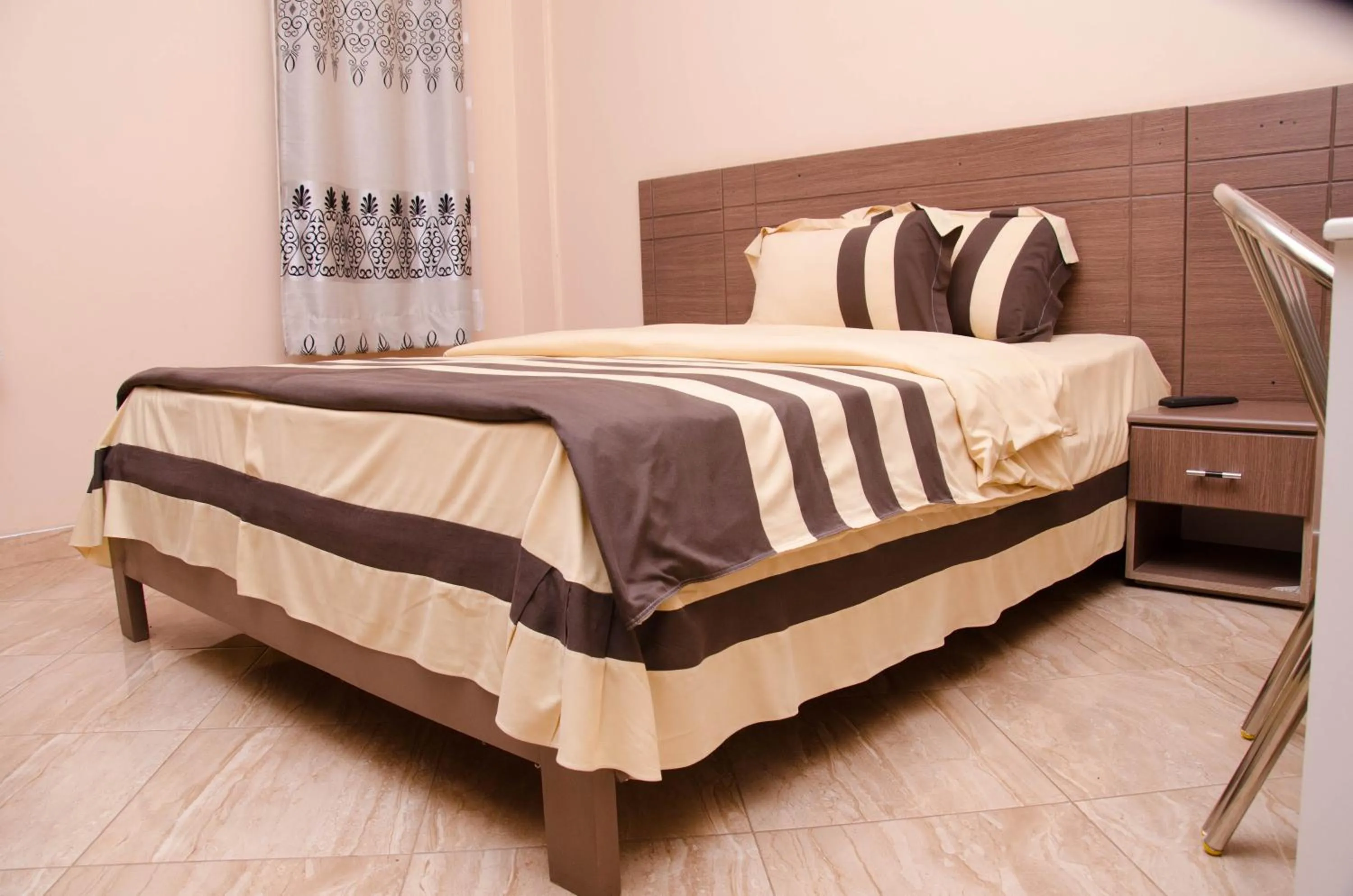 Bed in Agenda 2000 Hotels Ltd