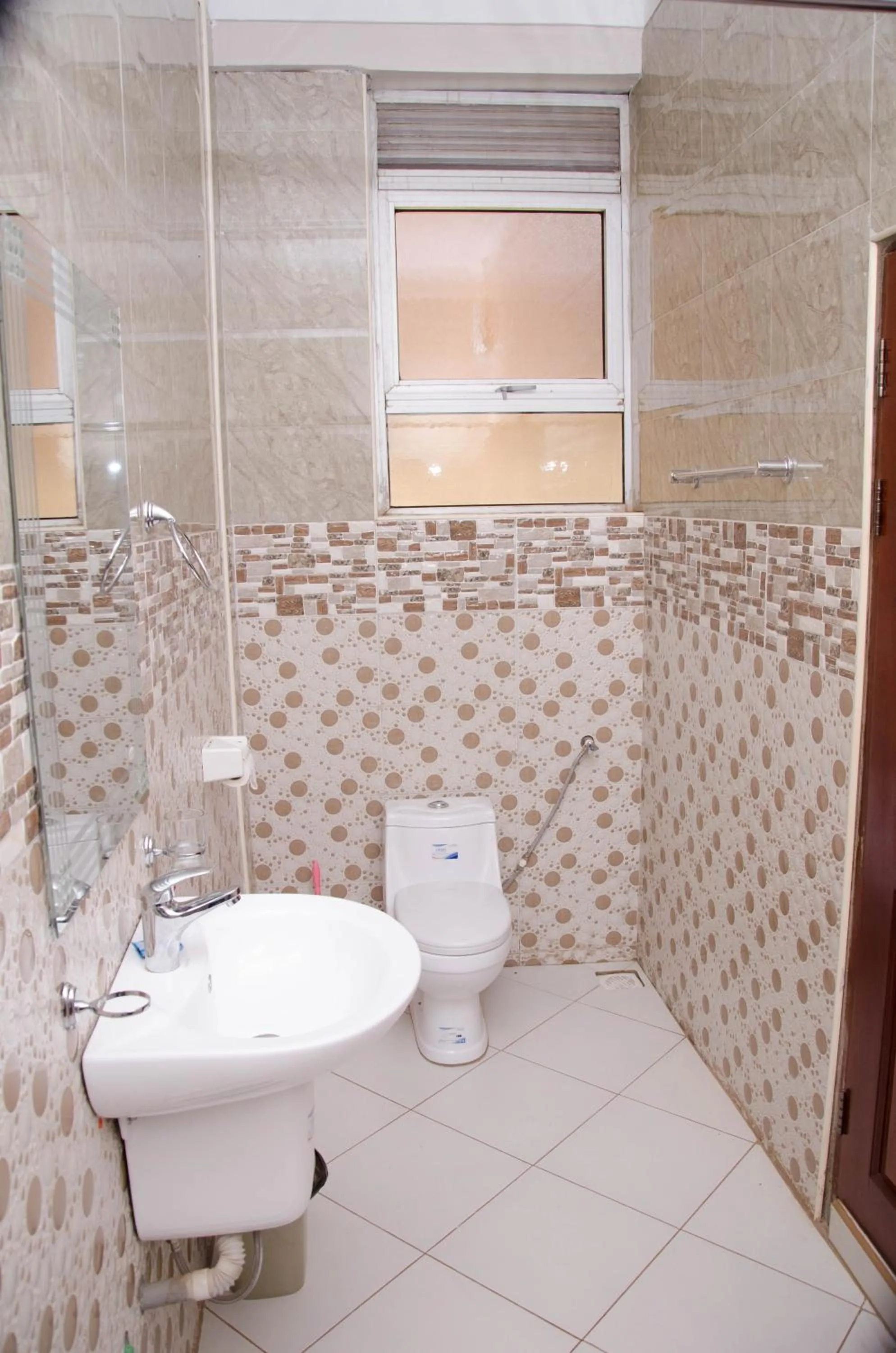 Toilet in Agenda 2000 Hotels Ltd