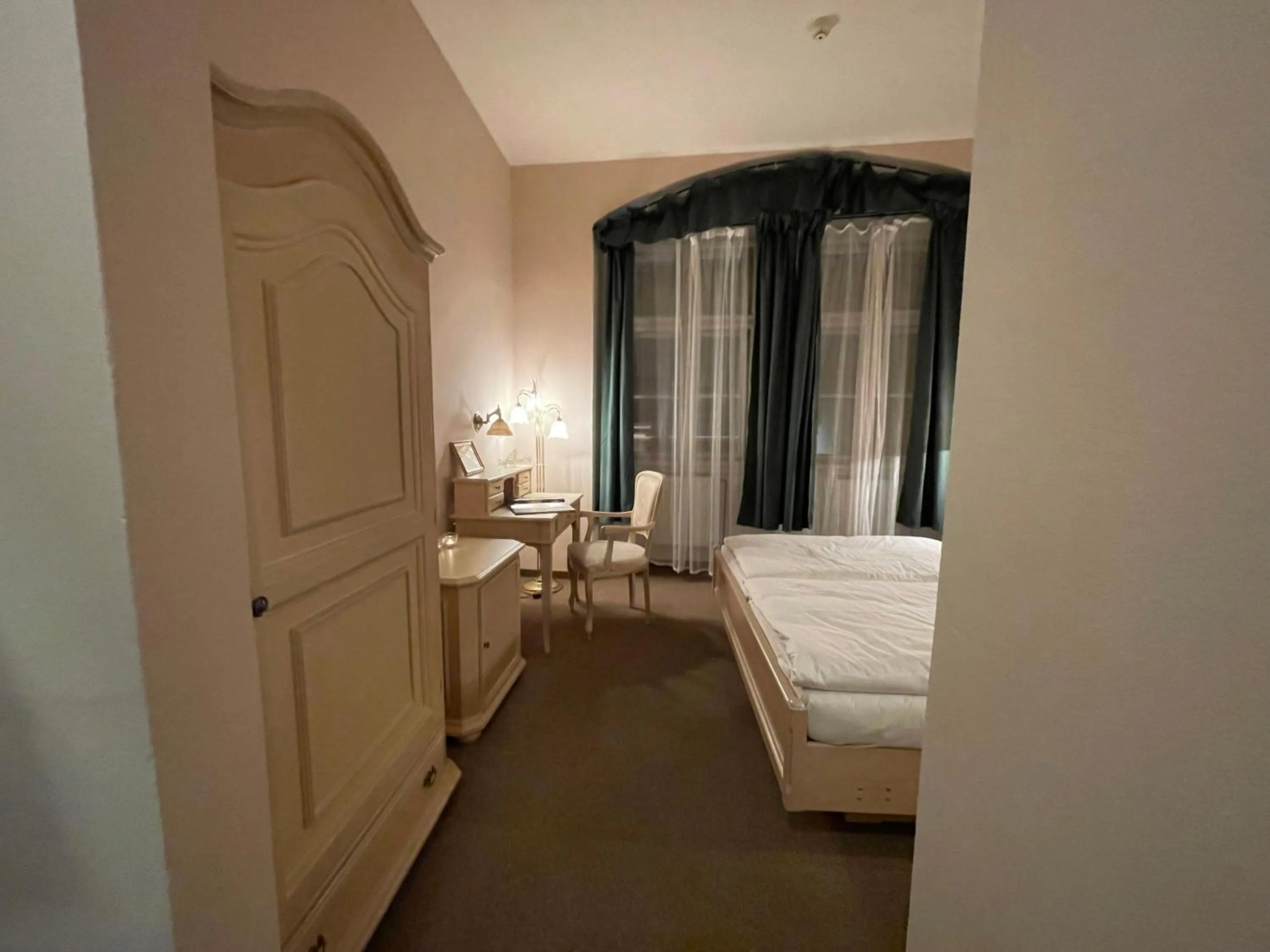 Bed in U Cervene zidle - Red Chair Hotel