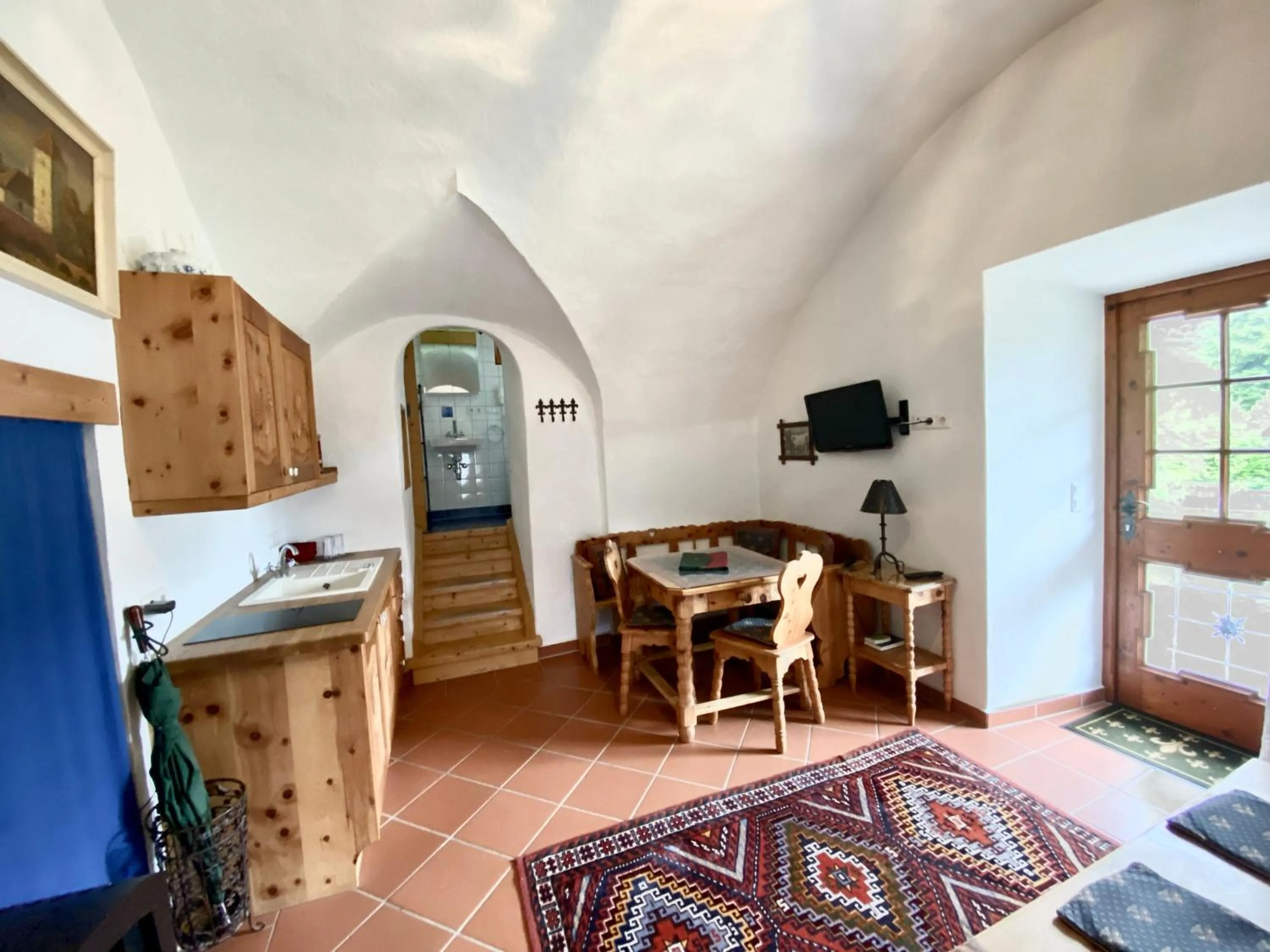 Kitchen or kitchenette in Aparthotel Schloss Thannegg