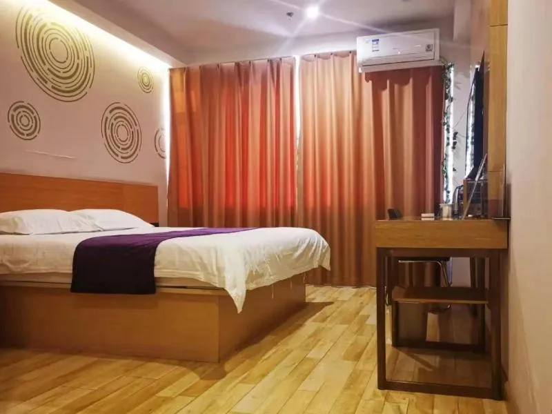 Bed in GreenTree Inn DaLian JinZhou District Light Industry College Express Hotel