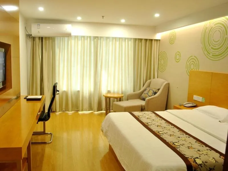 Bed in GreenTree Inn Chizhou High-Speed Railway Station Hotel