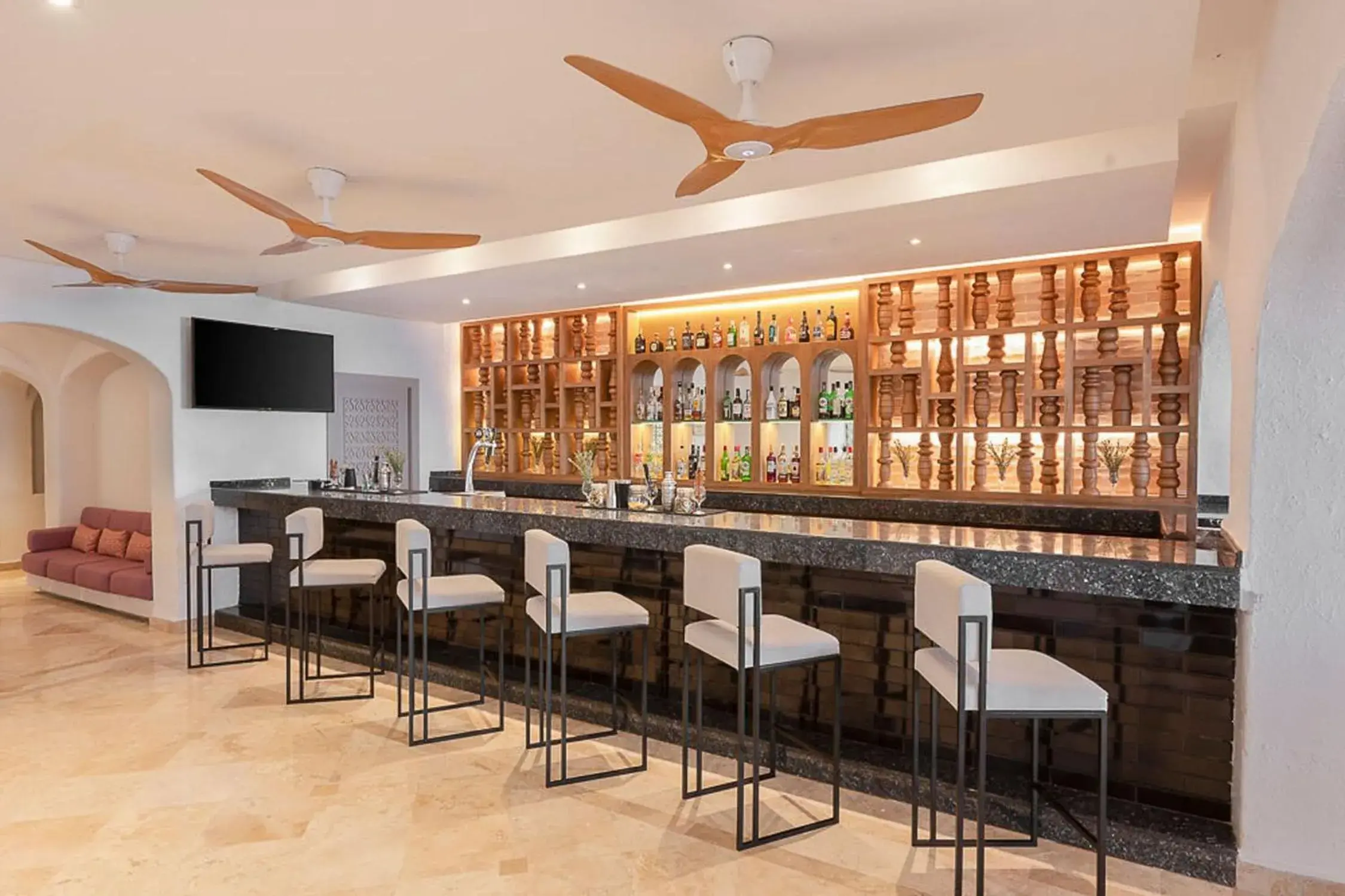 Lounge or bar in GR Solaris Caribe - All Inclusive Lounge or bar in GR Solaris Caribe - All Inclusive