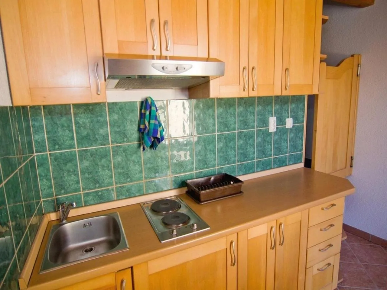 Kitchen or kitchenette in Apartments Sanda