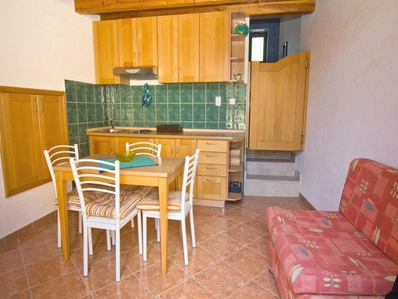 Kitchen or kitchenette in Apartments Sanda