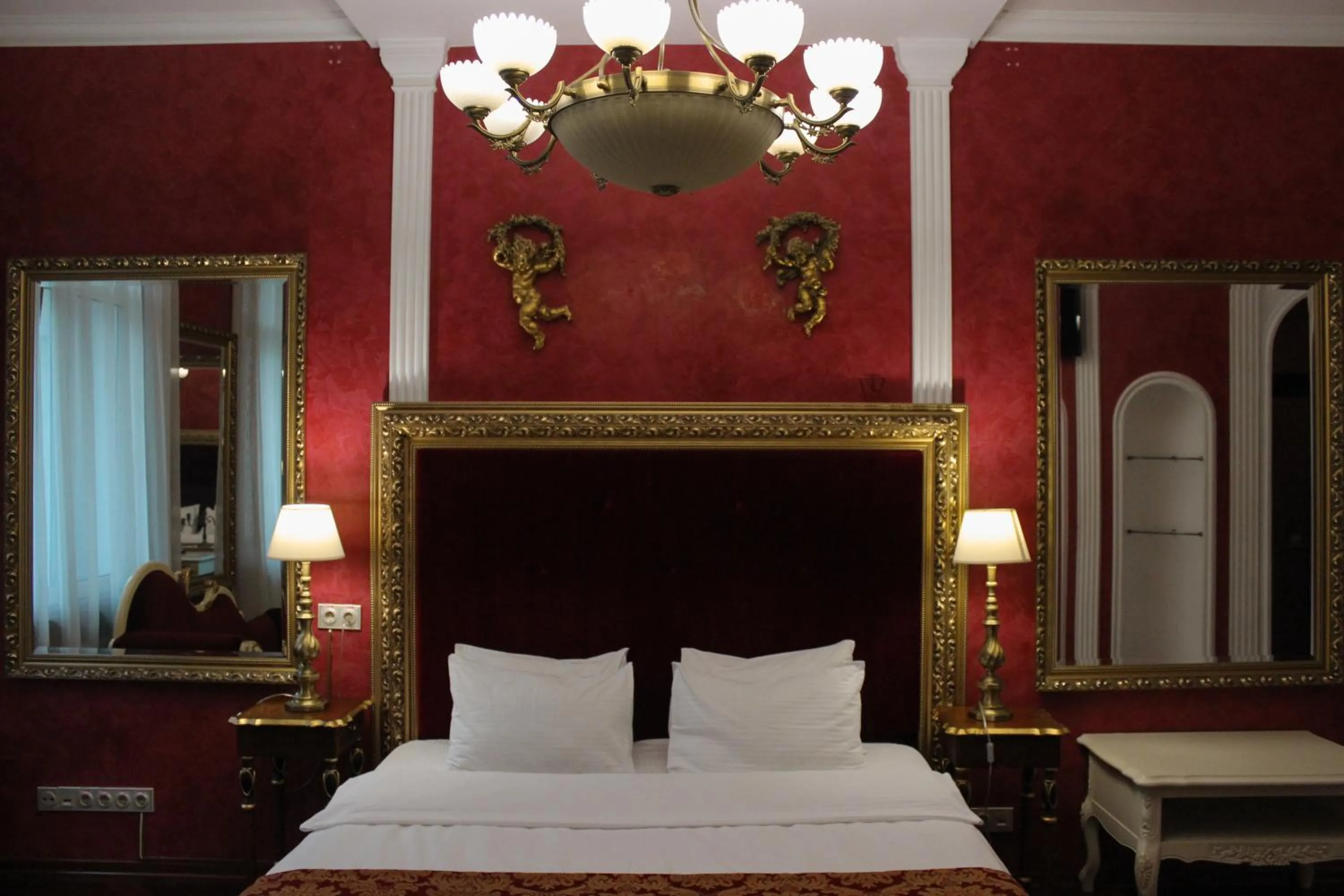 Bed in De Paris Hotel