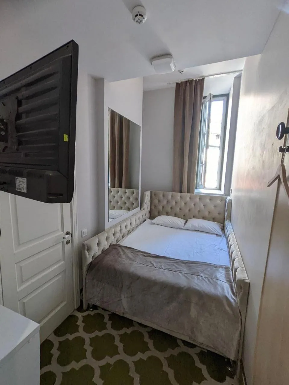 Bed in De Paris Hotel