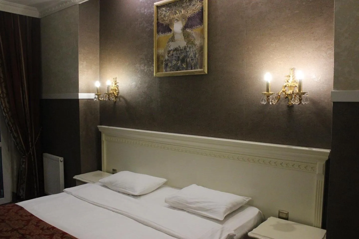 Bed in De Paris Hotel