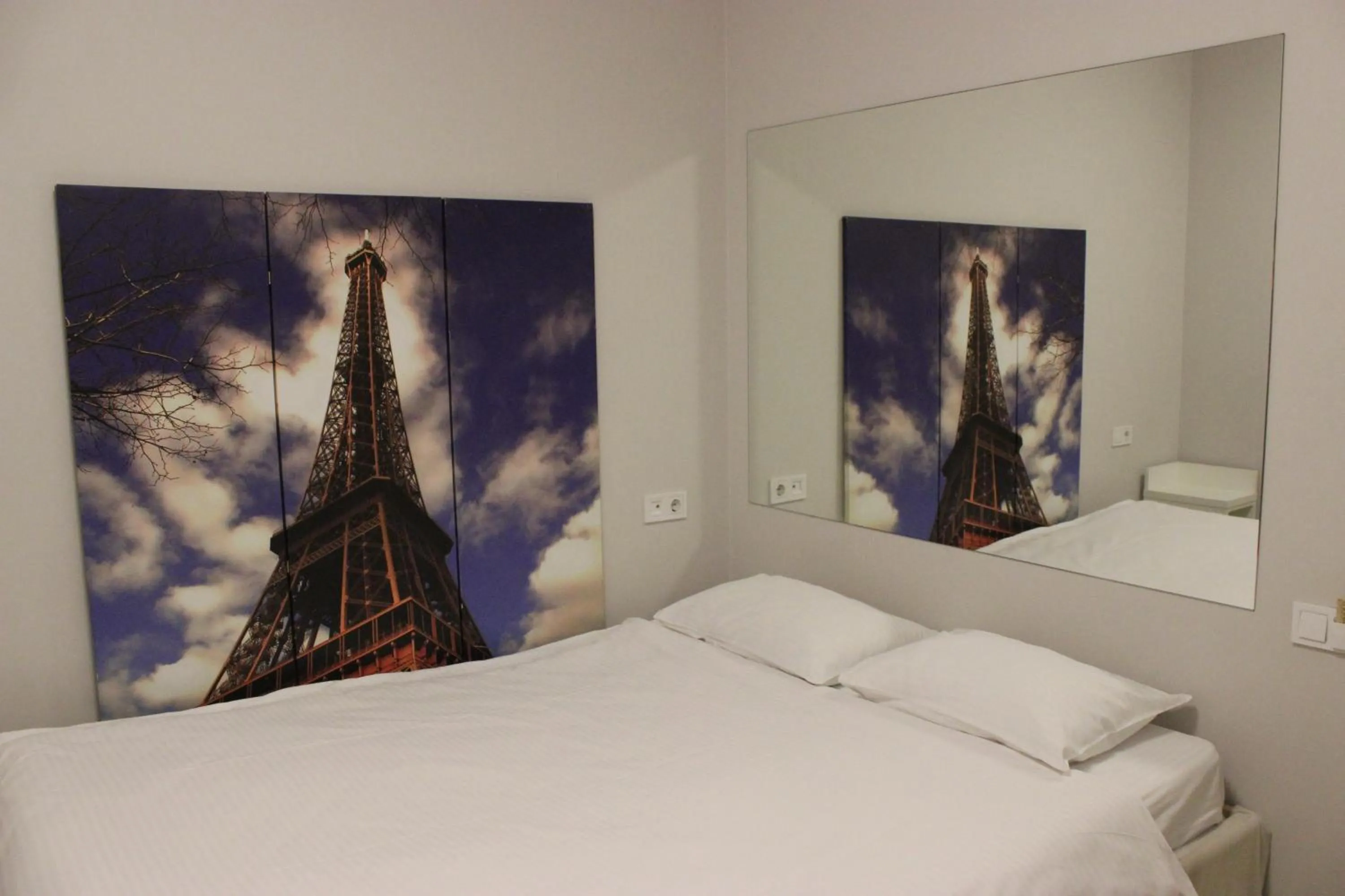 Bed in De Paris Hotel