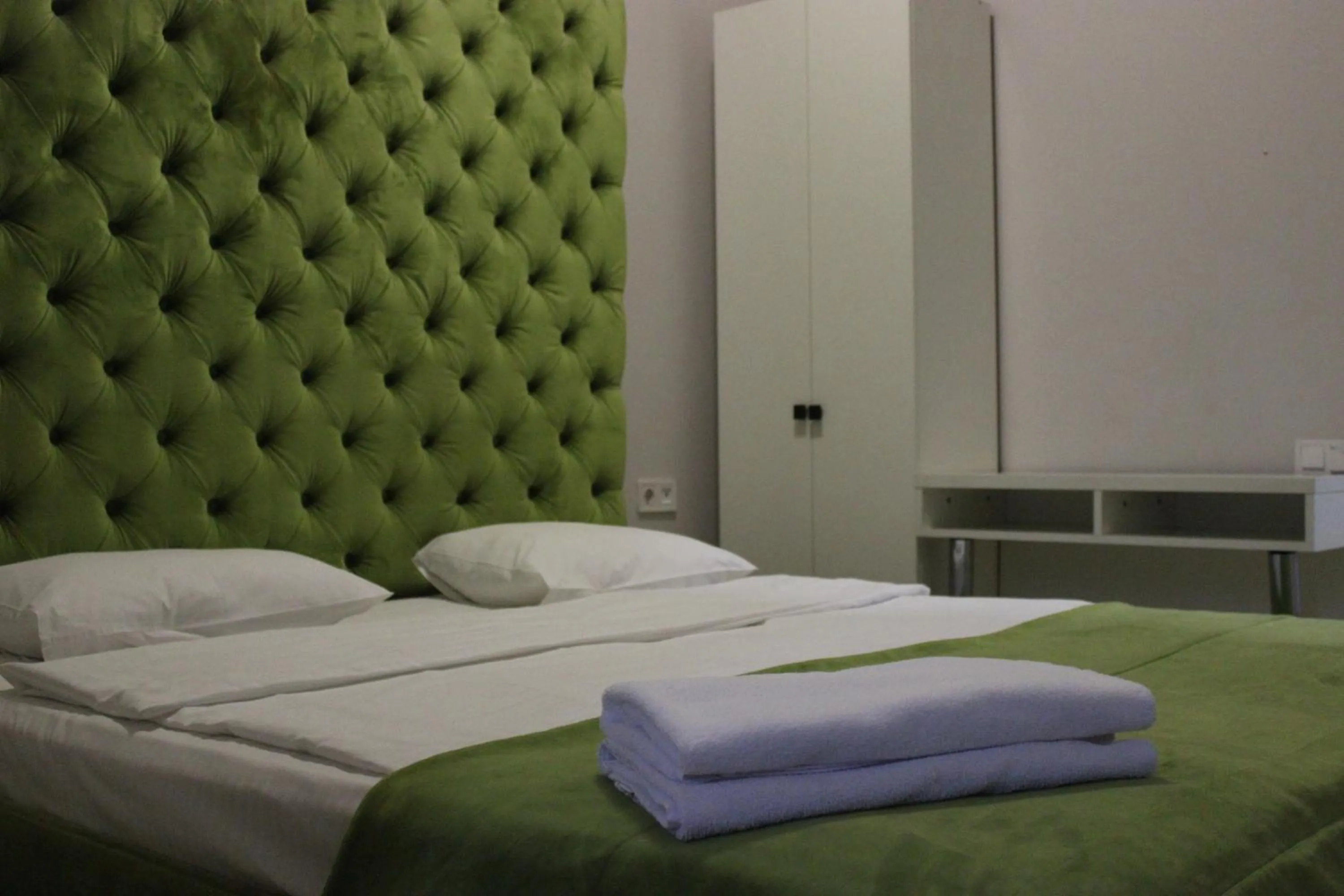 Bed in De Paris Hotel