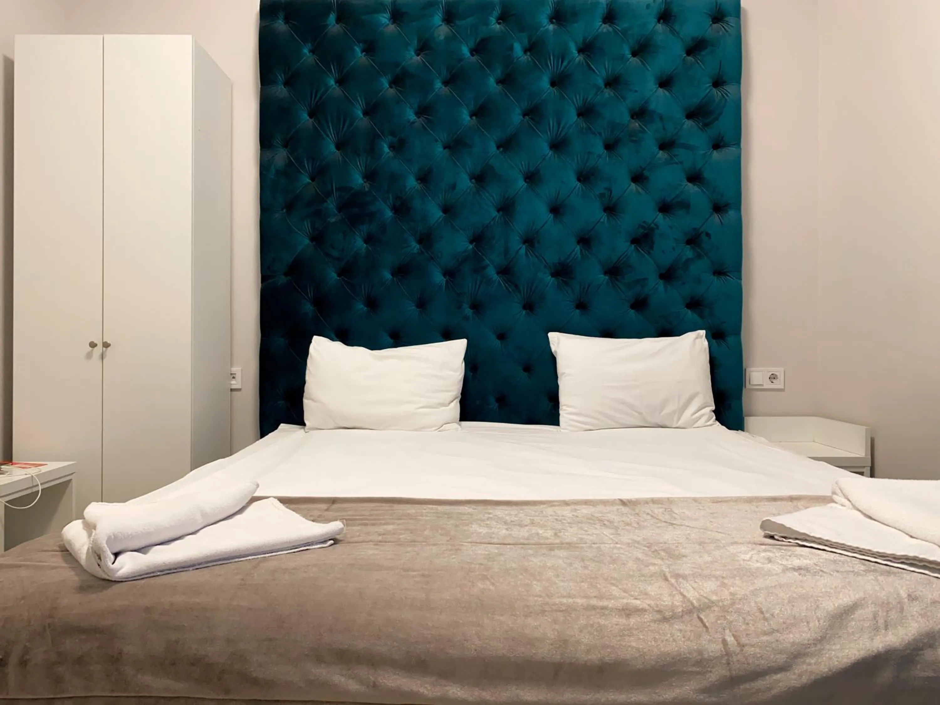 Bed in De Paris Hotel