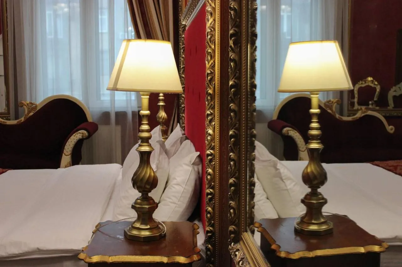 Bed in De Paris Hotel