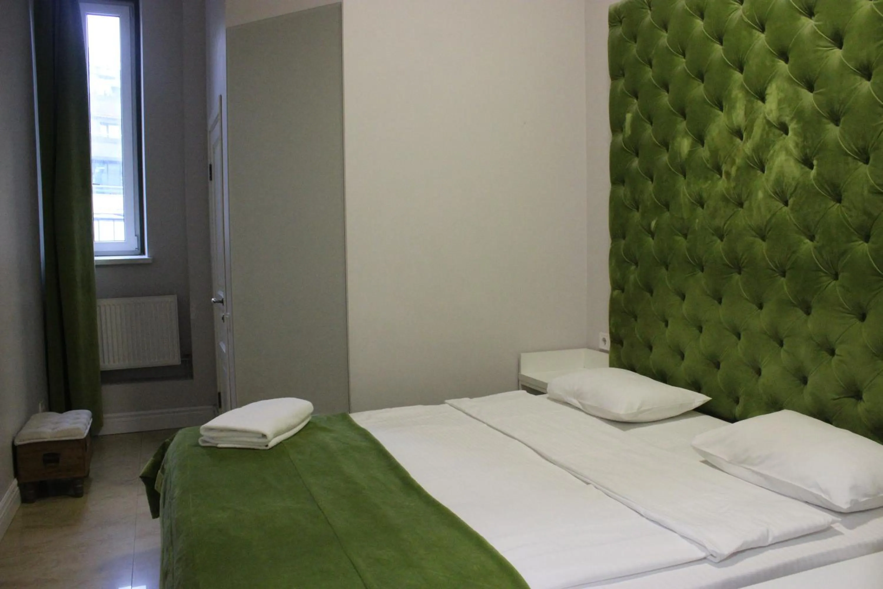 Bed in De Paris Hotel