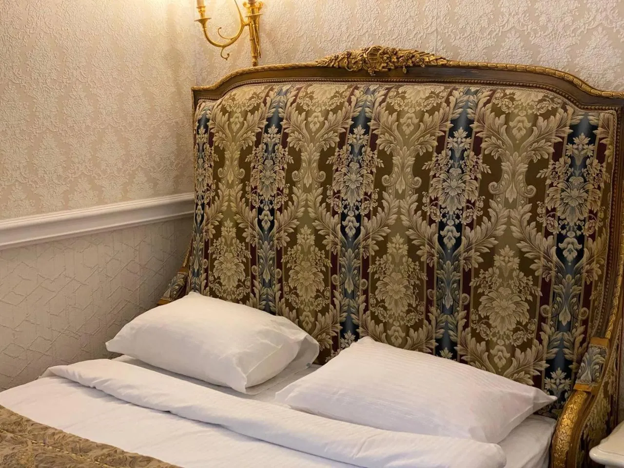 Bed in De Paris Hotel