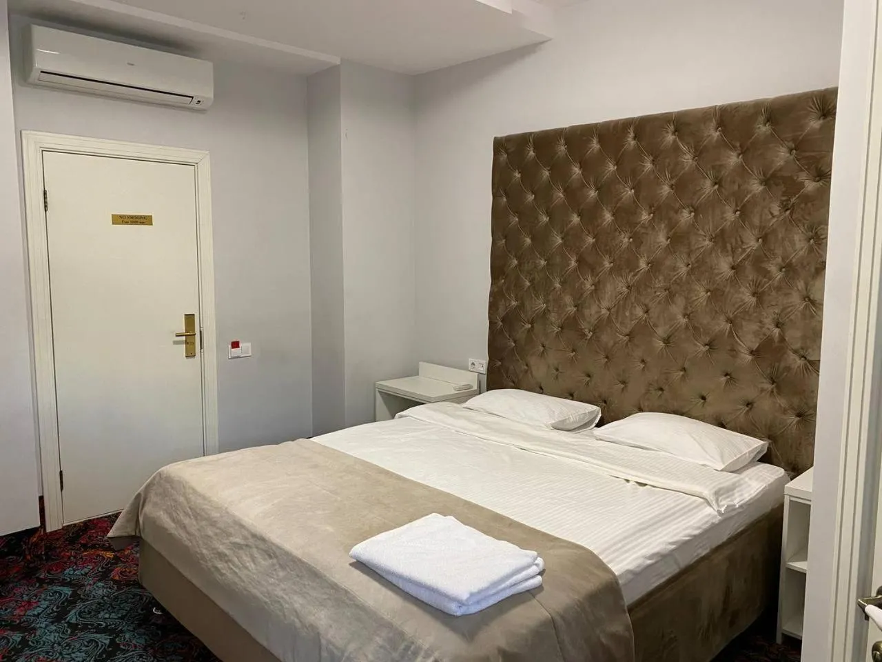 Bed in De Paris Hotel