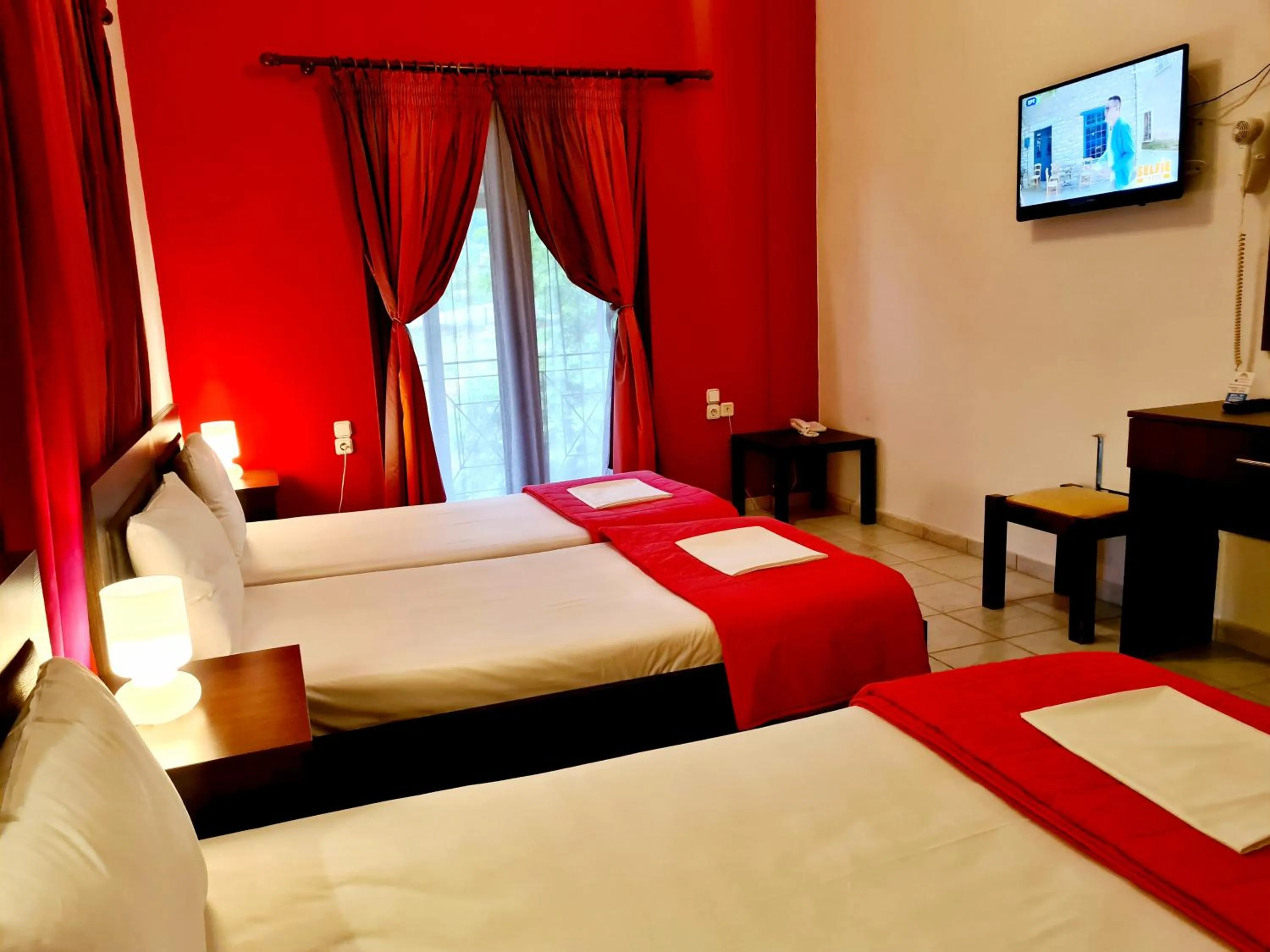 Bed in Hotel Odysseas