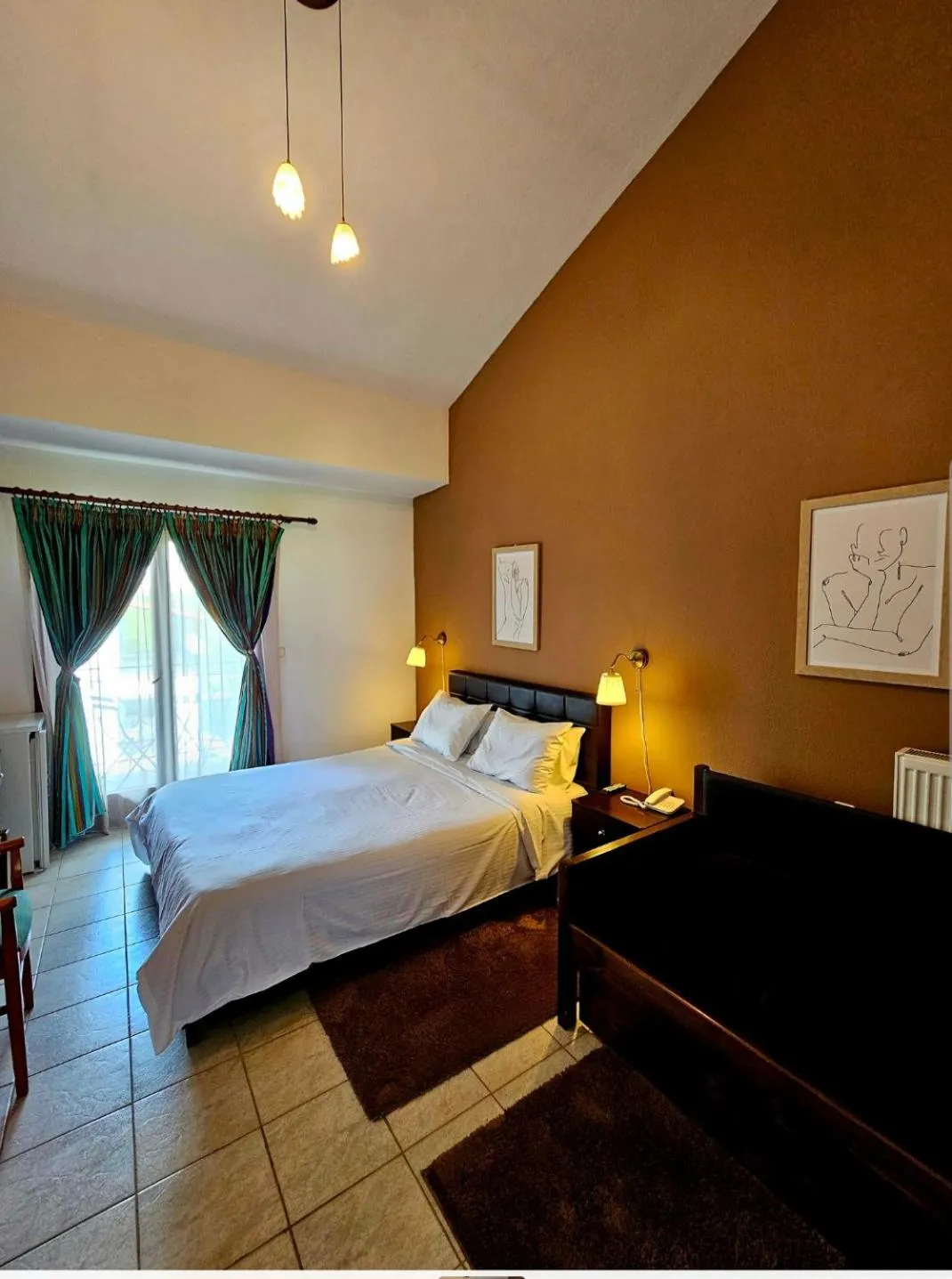 Bed in Hotel Odysseas