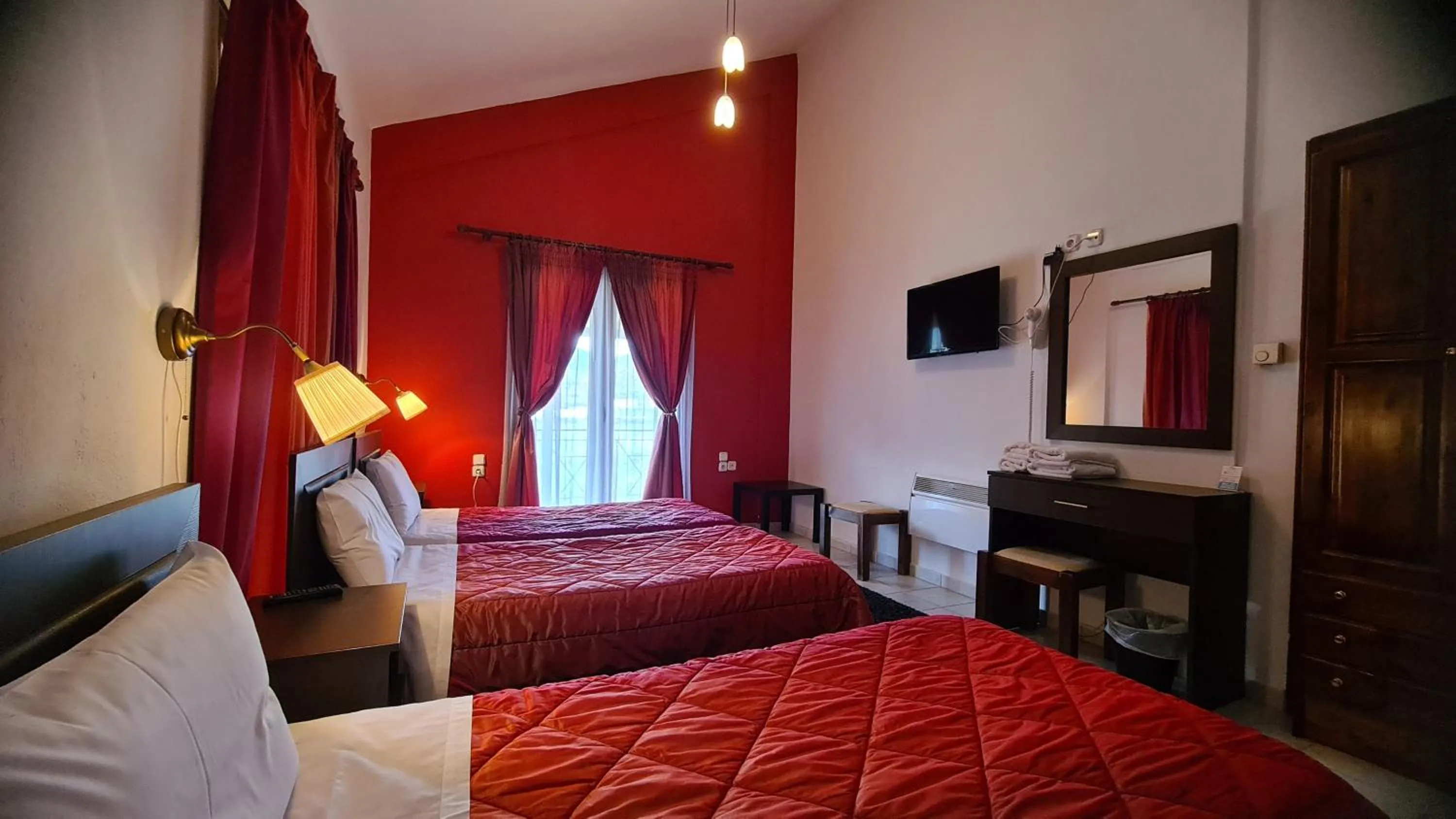 Bed in Hotel Odysseas