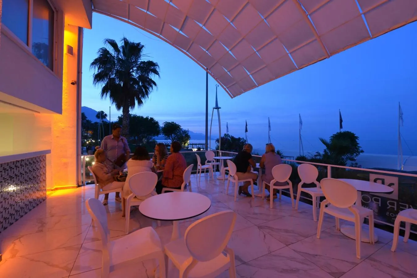 Sunset in Olimpos Beach Hotel by RRH&R