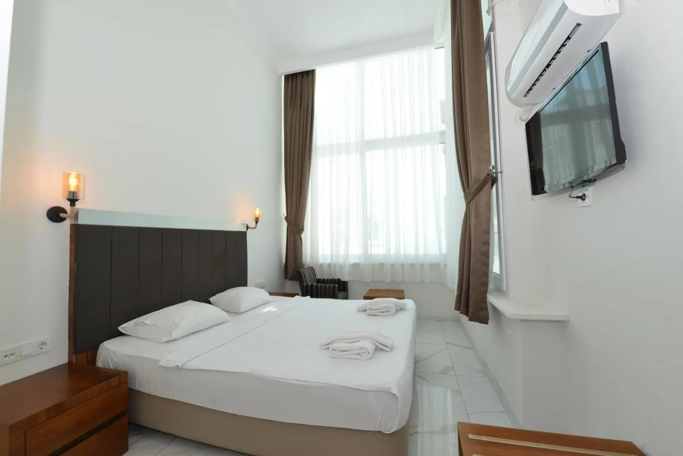 Photo of the whole room, Bed in Olimpos Beach Hotel by RRH&R