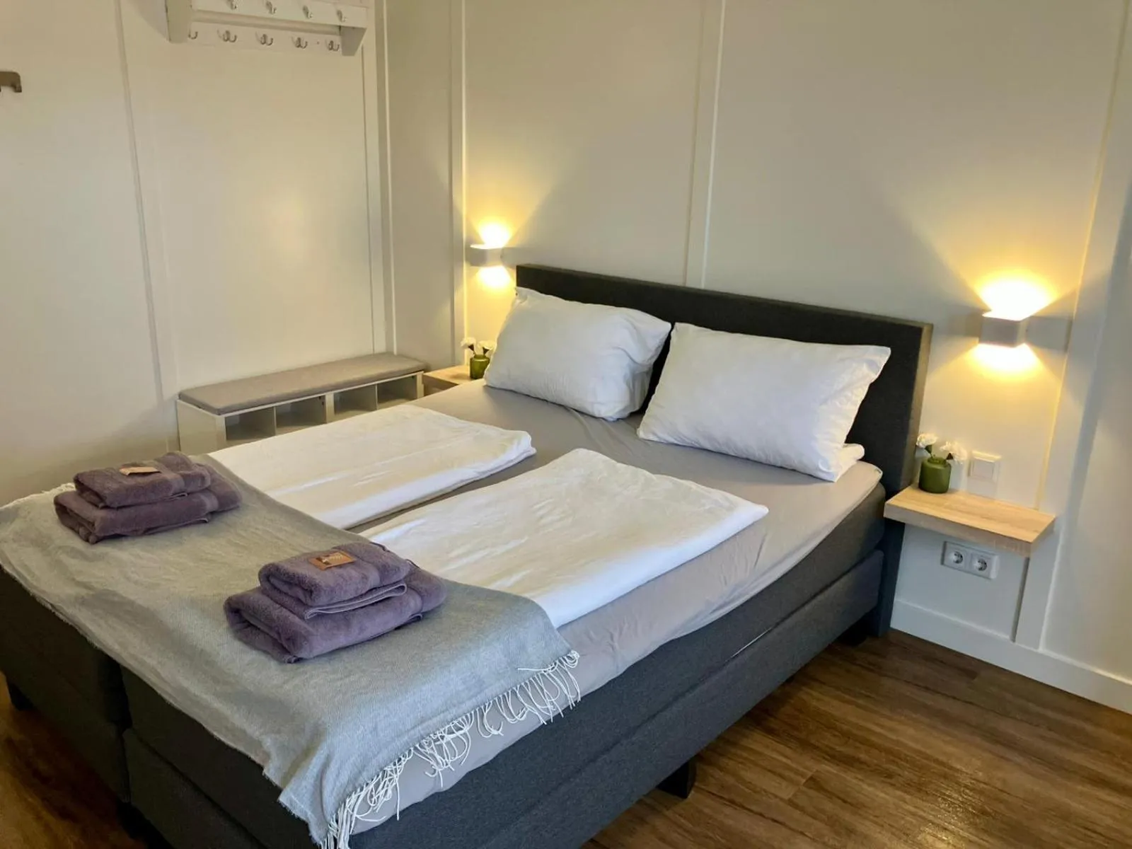 Bed in Die zwei Löwen Ferienwohnungen