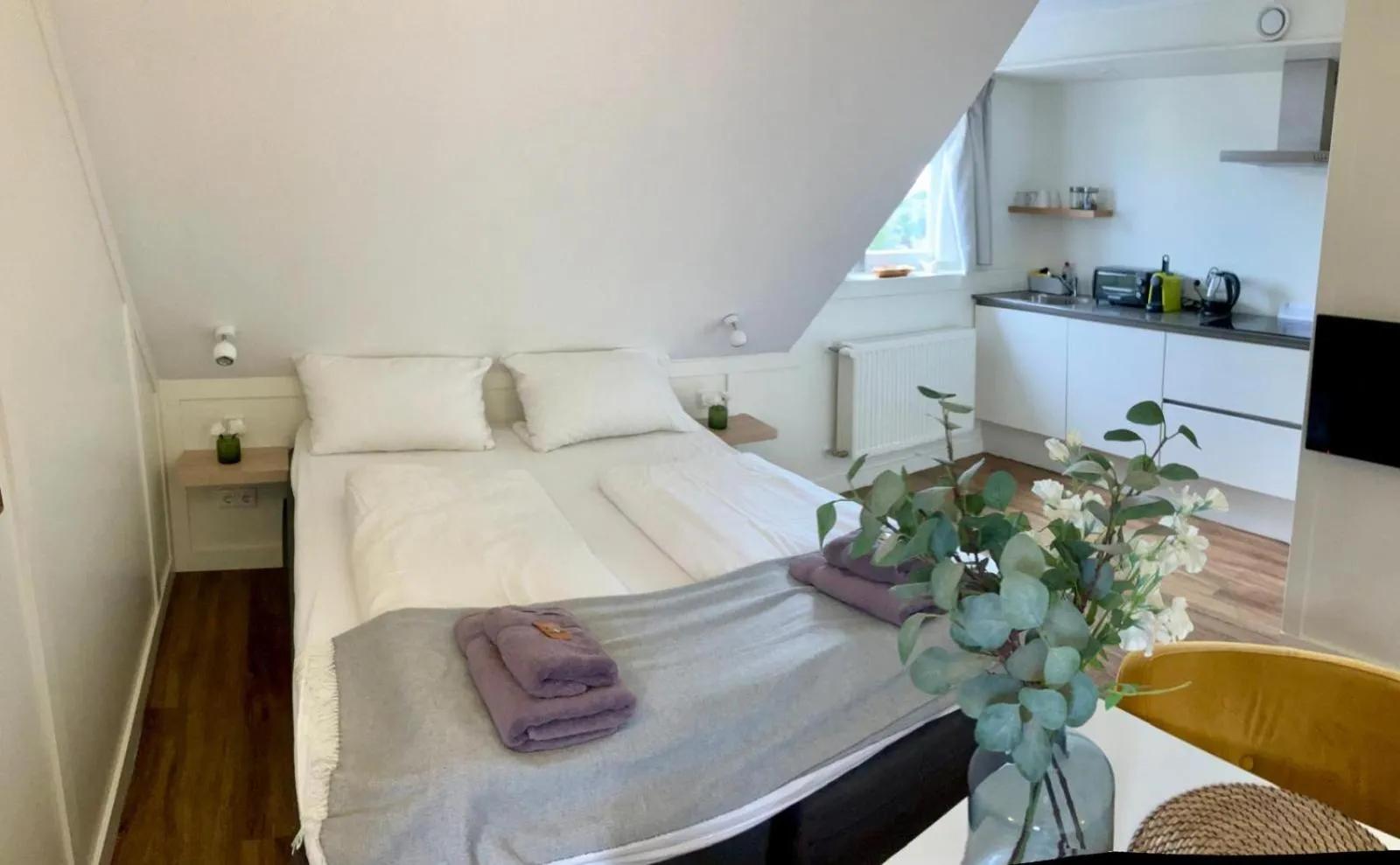 Bed in Die zwei Löwen Ferienwohnungen