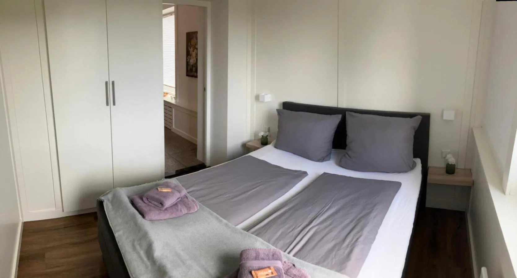 Bed in Die zwei Löwen Ferienwohnungen