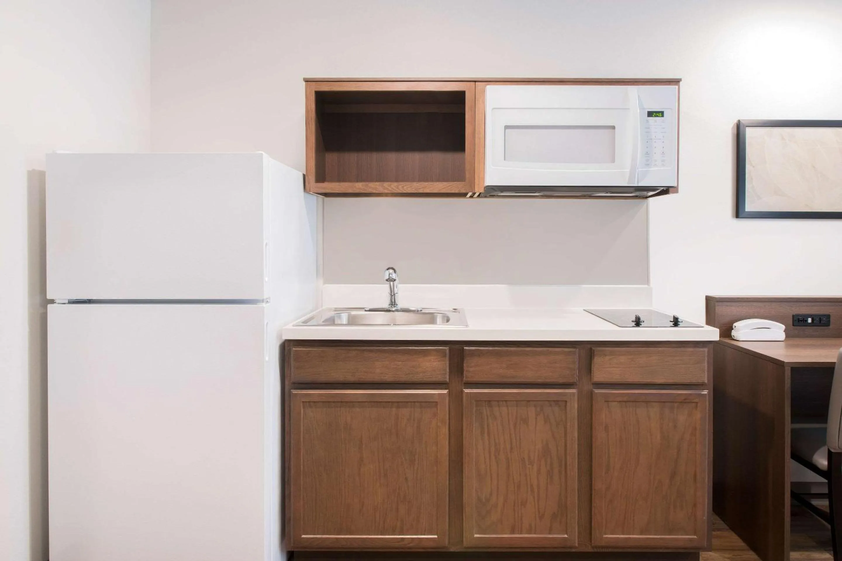 Kitchen or kitchenette in WoodSpring Suites Savannah Pooler