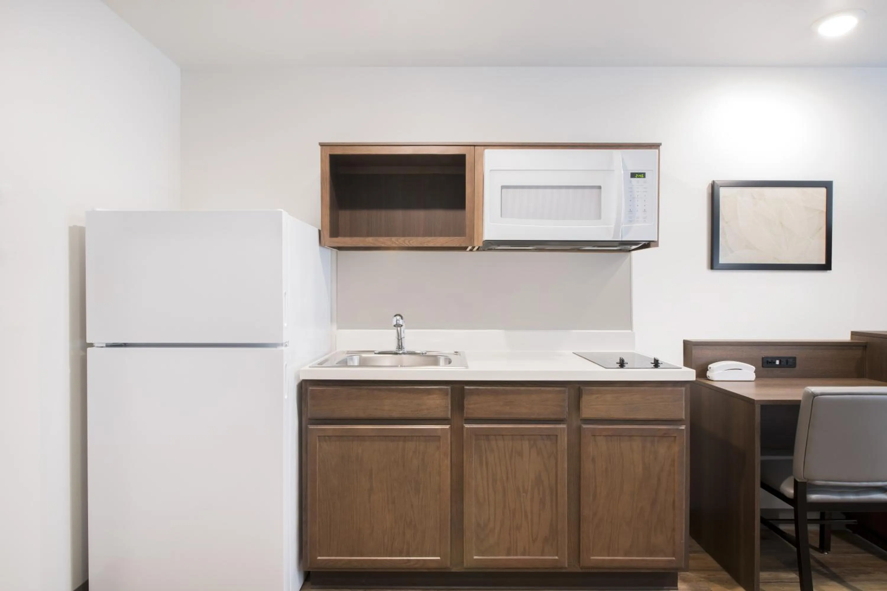 Kitchen or kitchenette in WoodSpring Suites Savannah Pooler