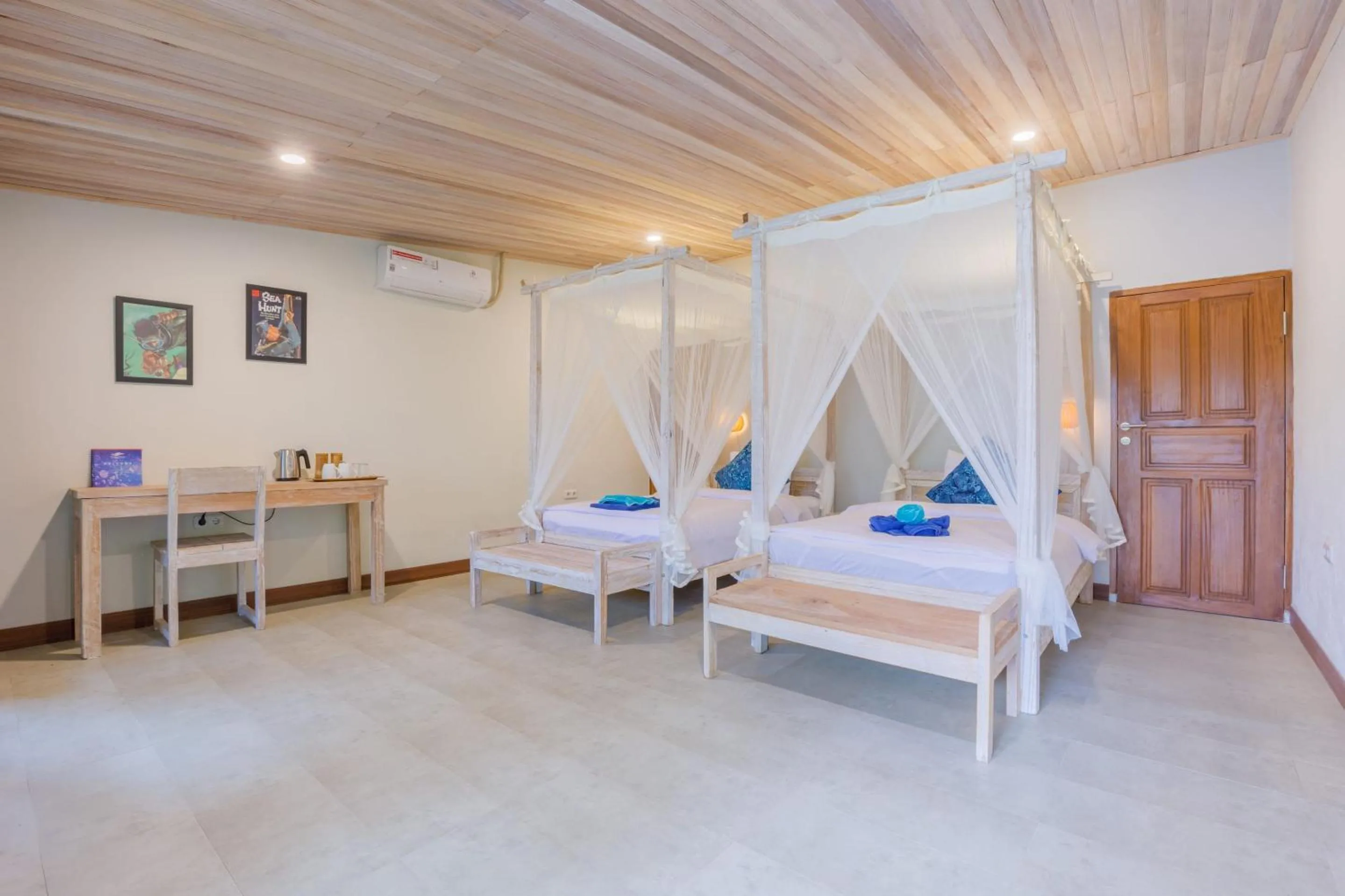 Bed in Thalassa Dive Resort Lembeh