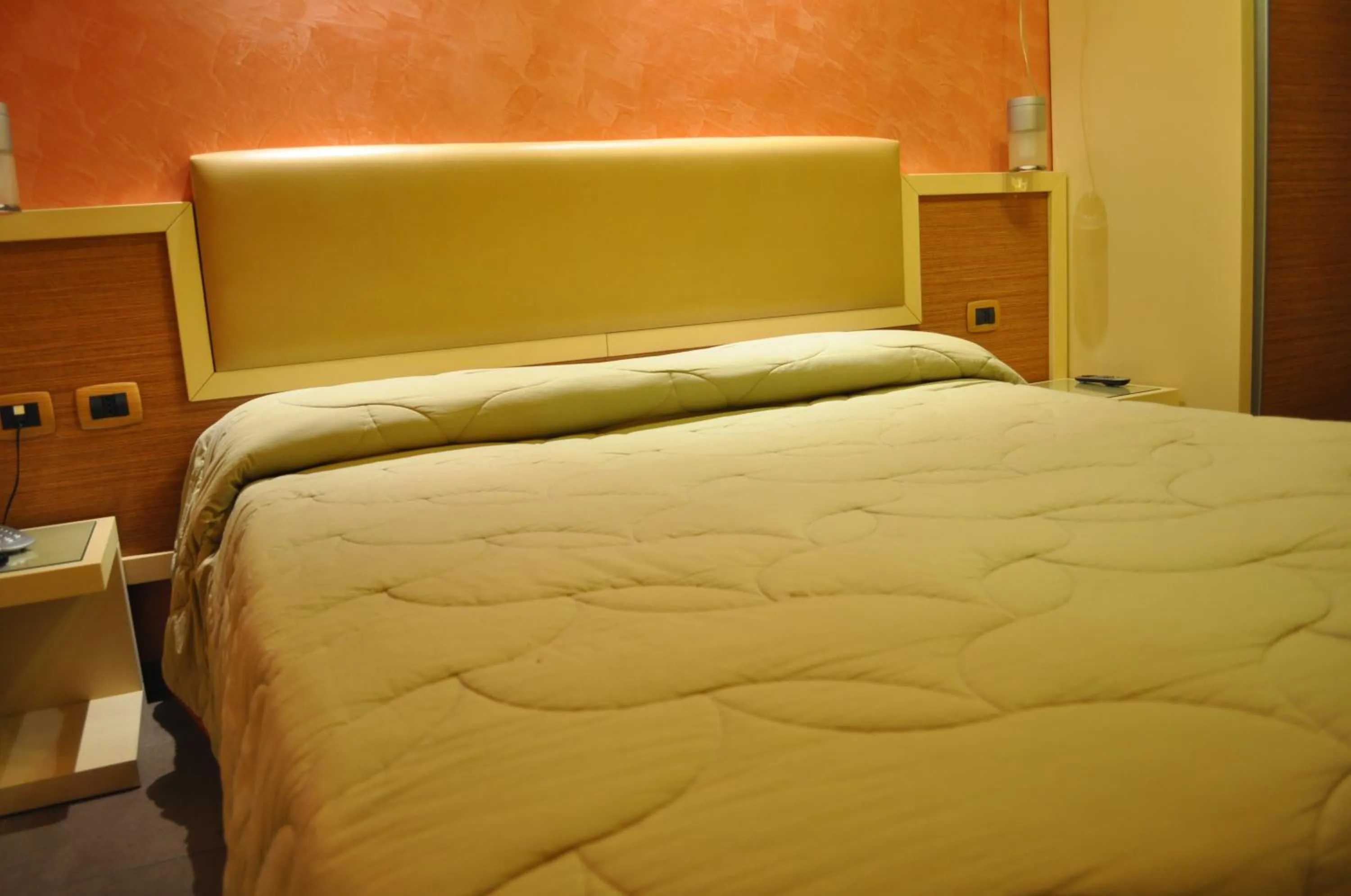 Bed in Aerhotel Phelipe