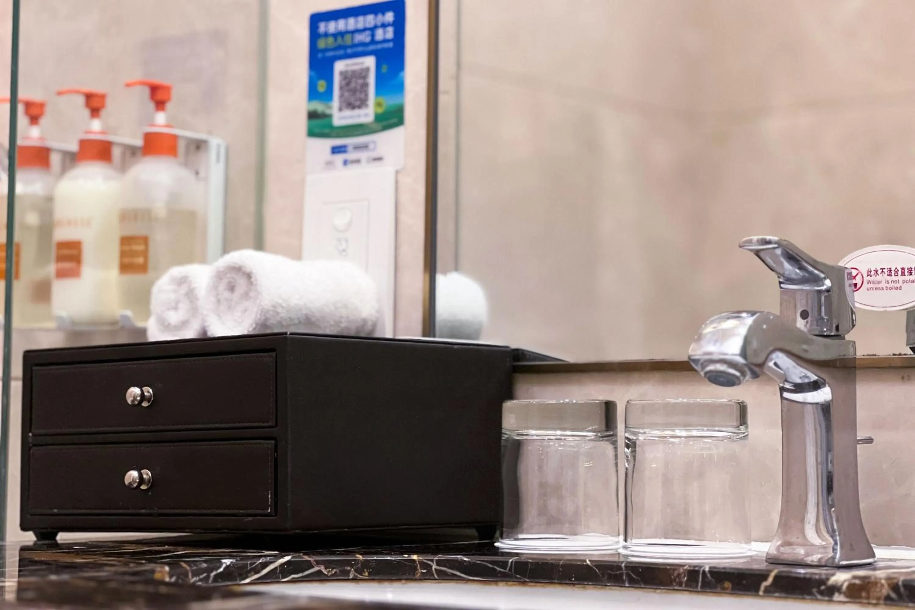 Bathroom in Crowne Plaza Zhengzhou by IHG