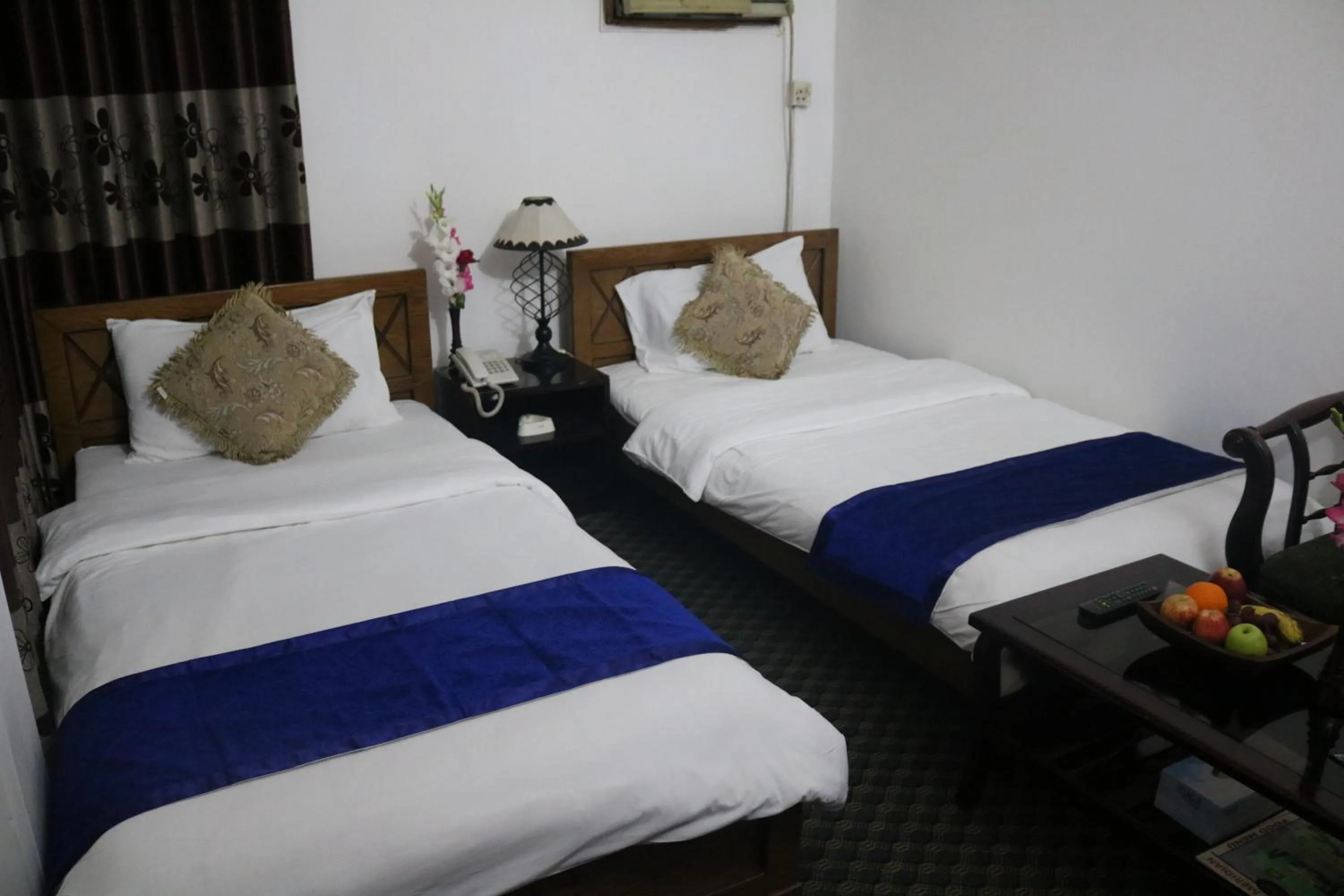 Bed in Hotel De Meridian Ltd