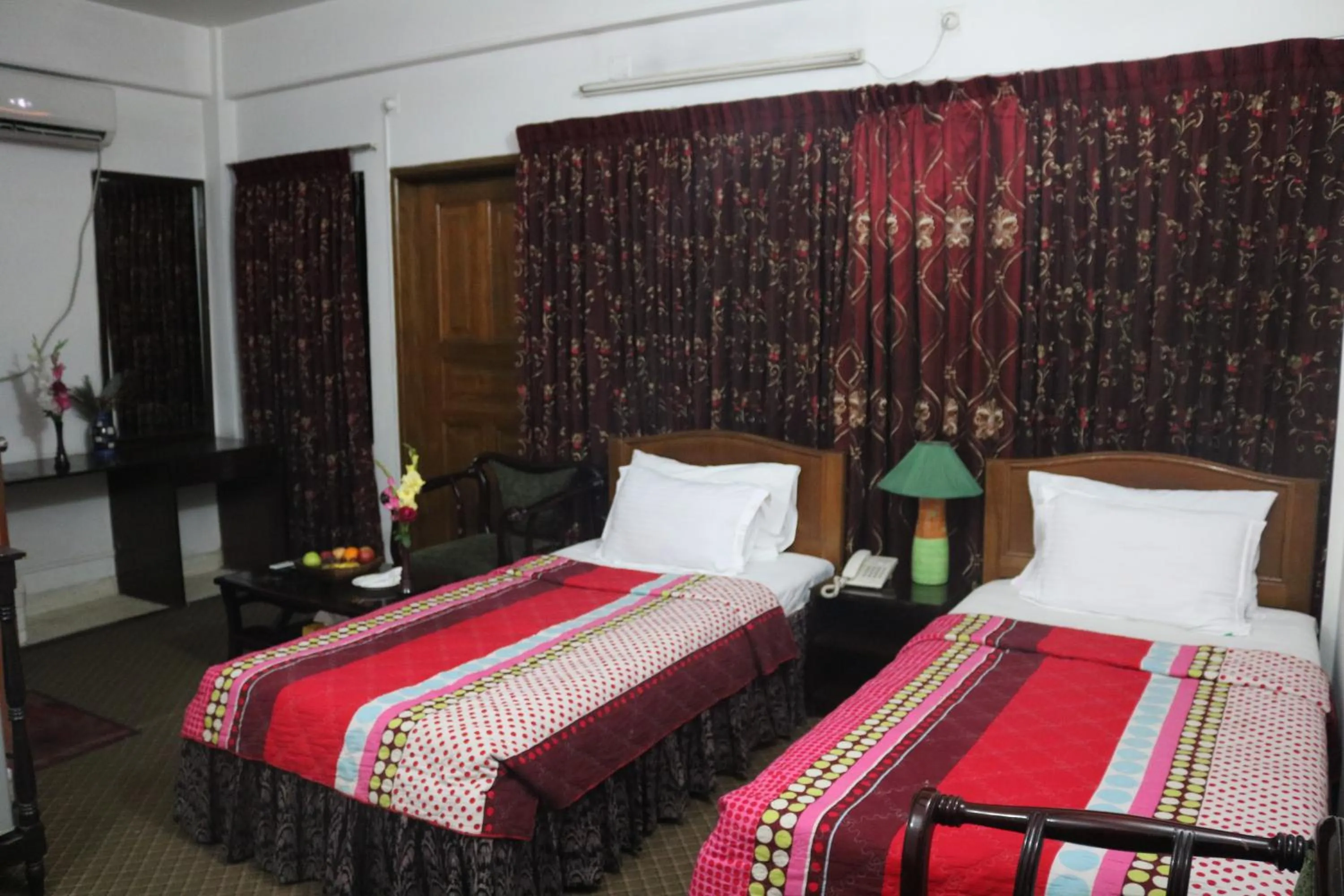 Bed in Hotel De Meridian Ltd