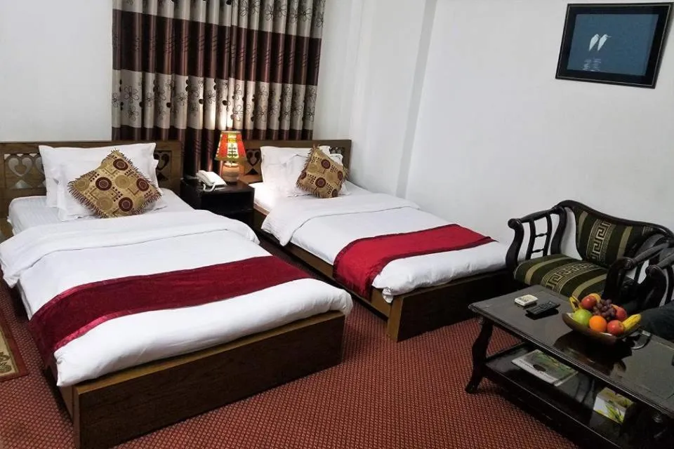 Bed in Hotel De Meridian Ltd