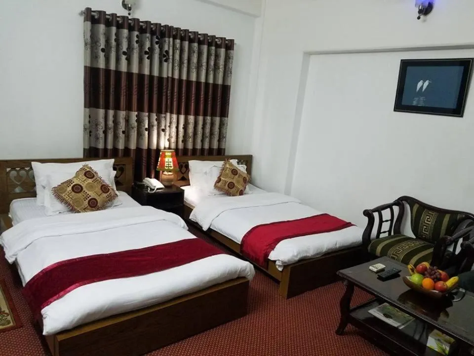 Bed in Hotel De Meridian Ltd